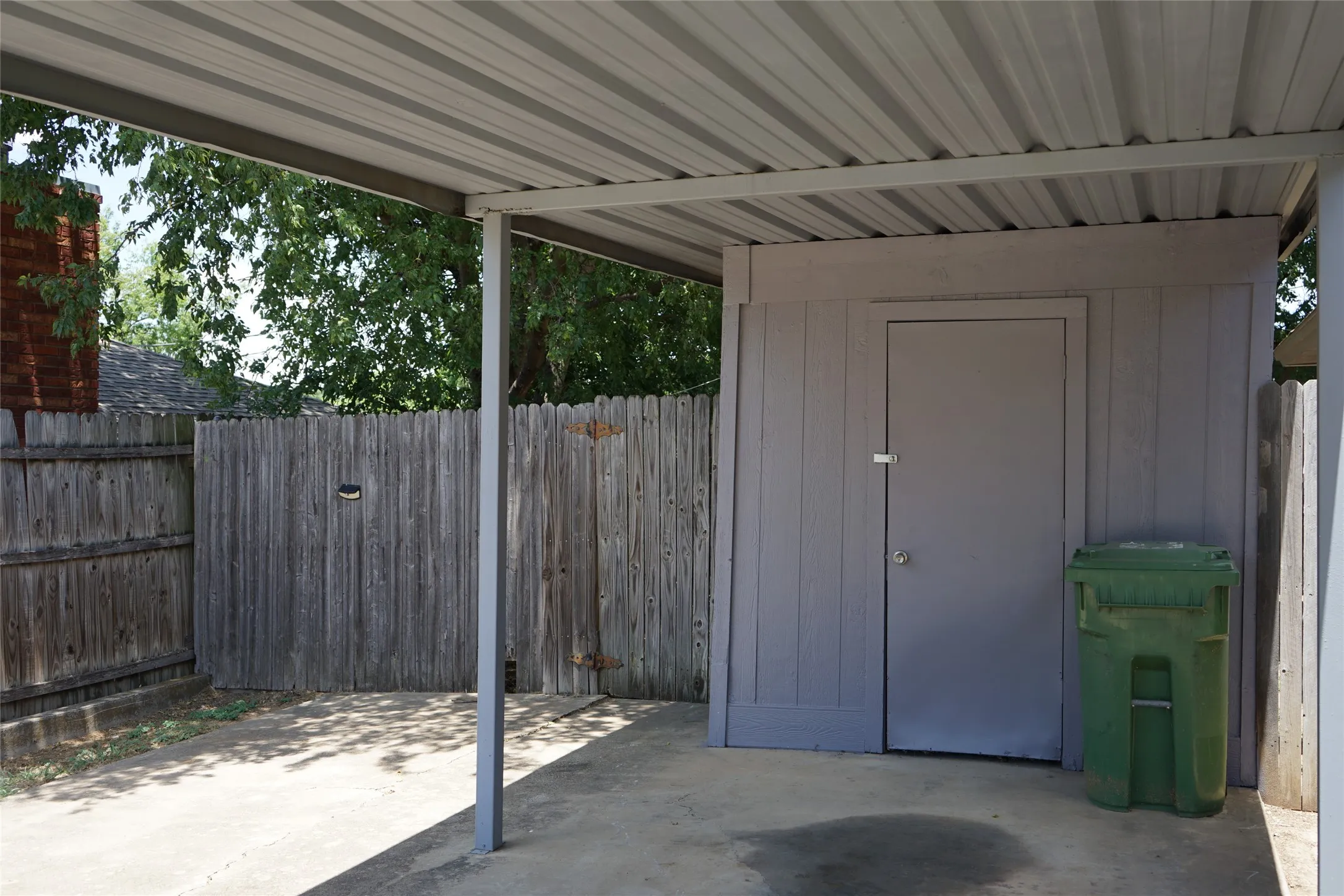 Single car carport and large storage closet
