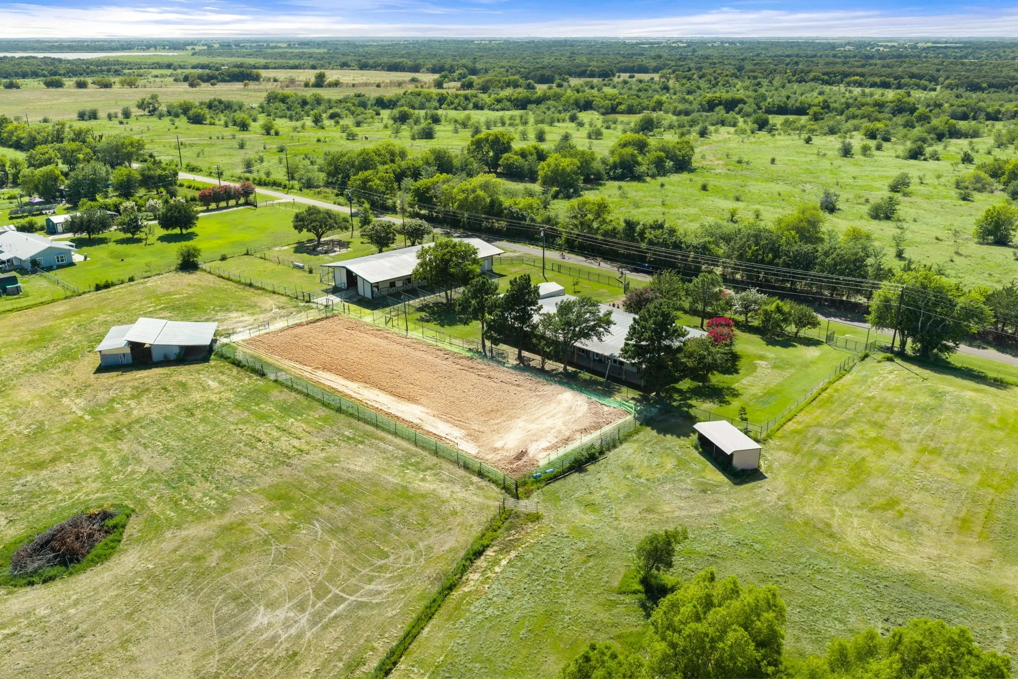 NOTE... arena now has grass in it. digital staged to show how it looks tilled