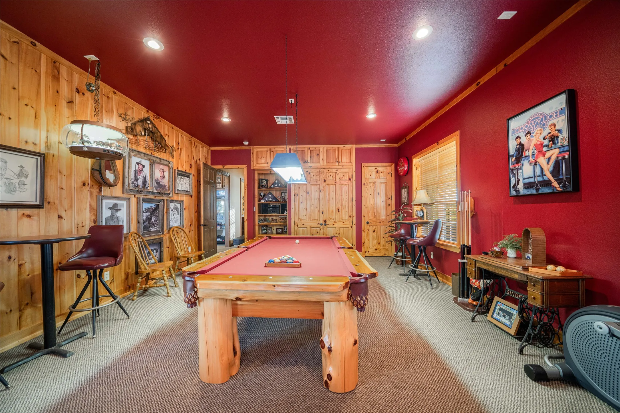 Recreation room featuring a pool table, wood paneling, recessed lighting, and a red ceiling