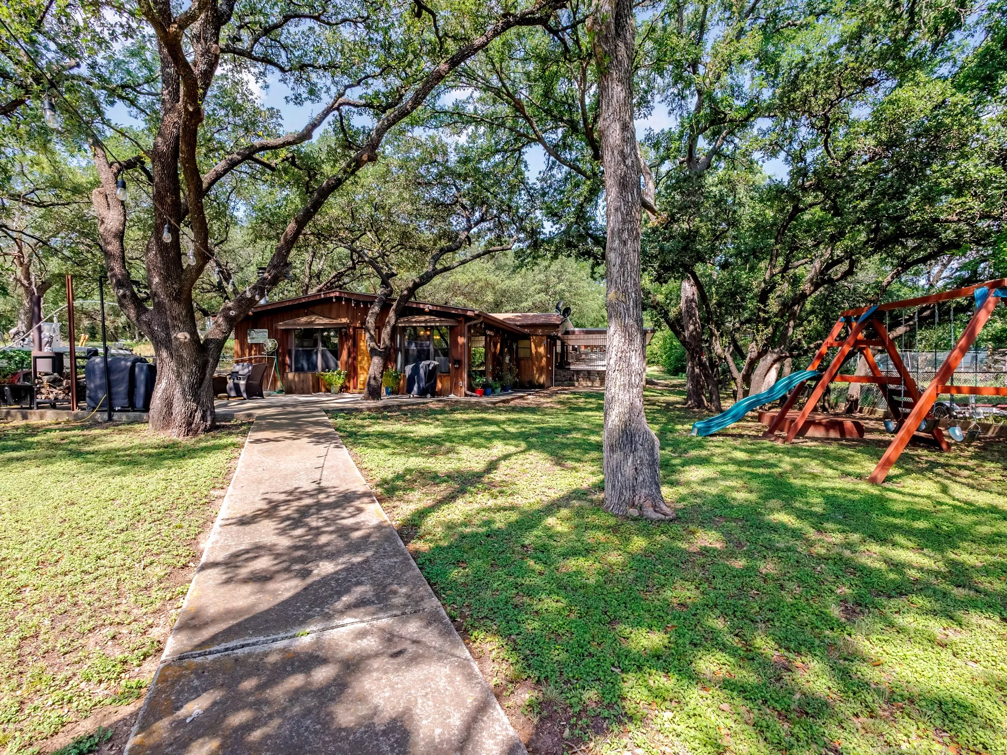 You’ll find easy access to a sandbox, playground, and a scenic path leading to the lake.