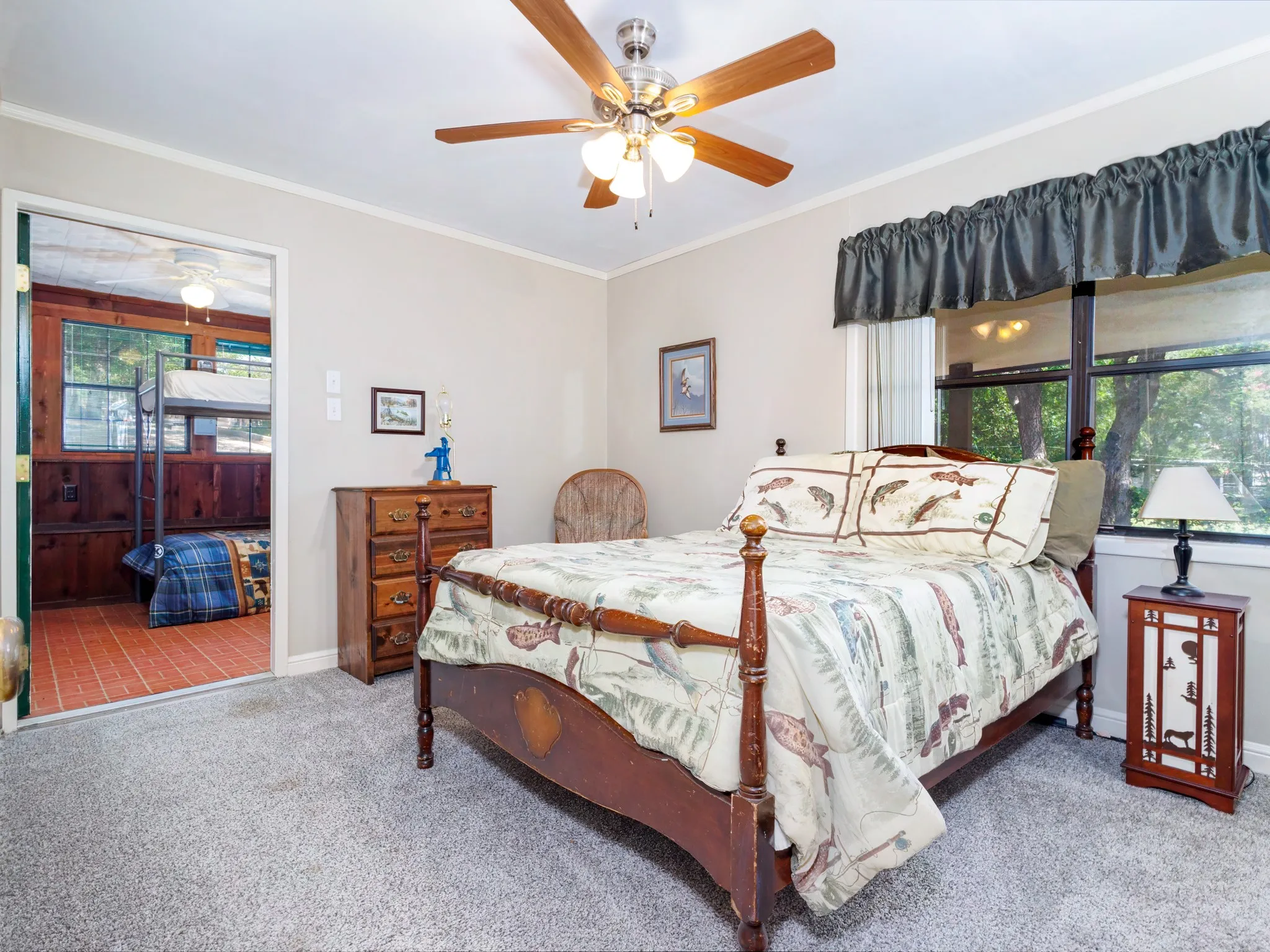 Access to the third bedroom is through the second bedroom.