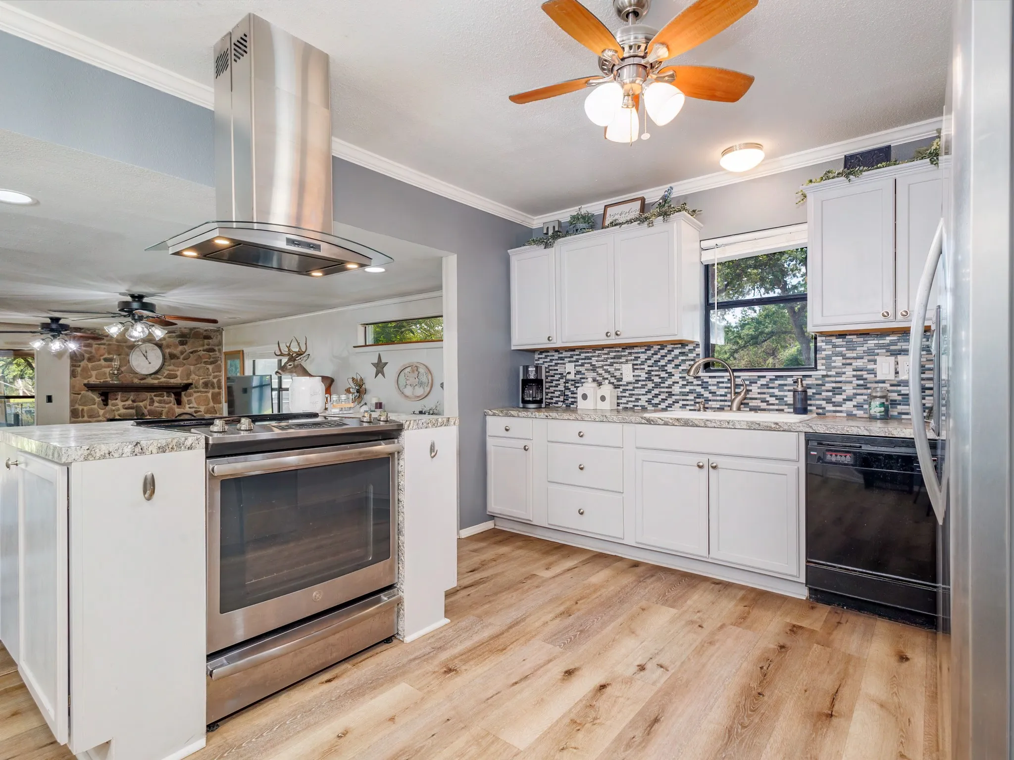 The kitchen offers a functional layout with beautiful lake views.