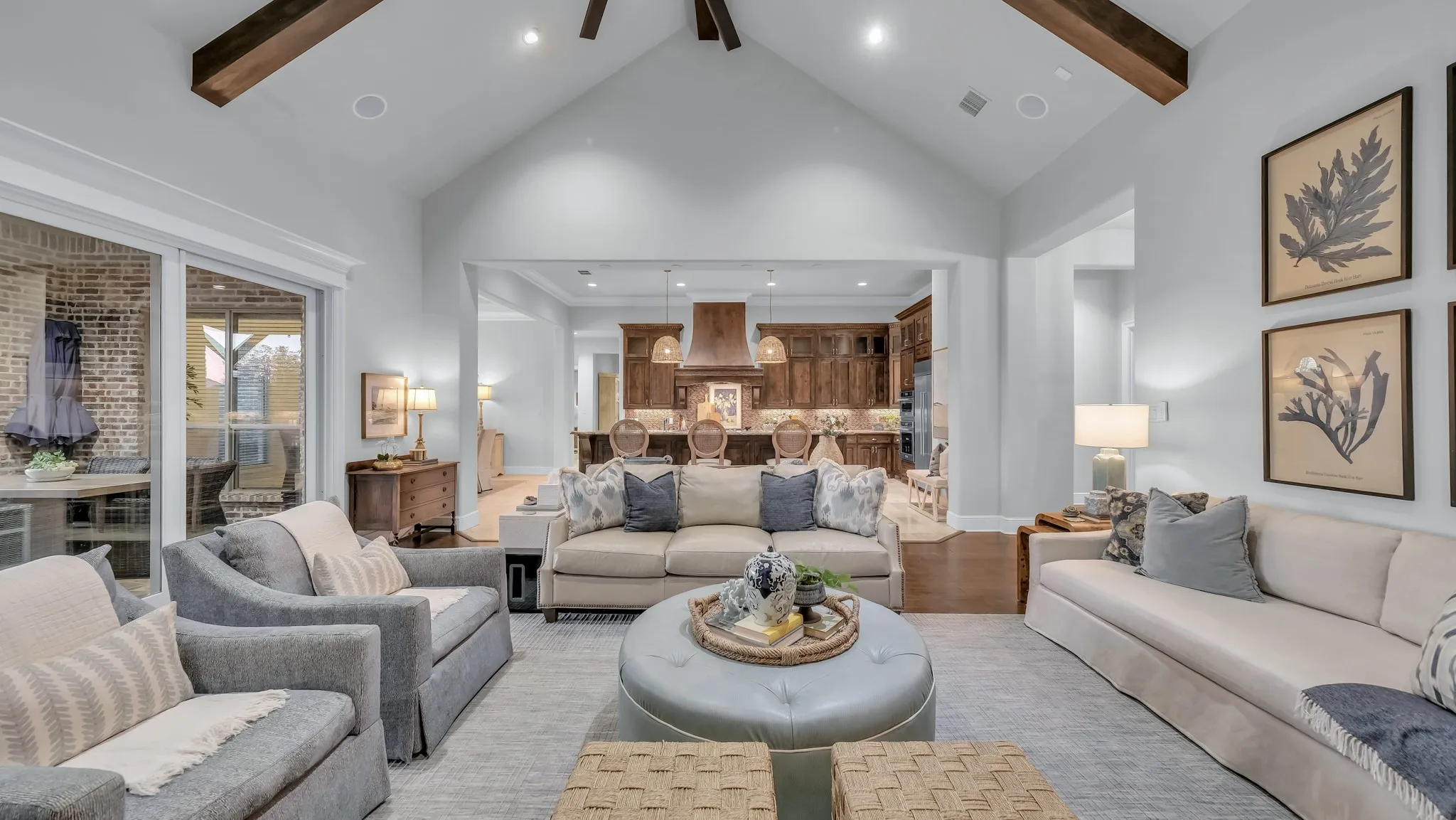 Vaulted ceiling featuring exposed wood beams