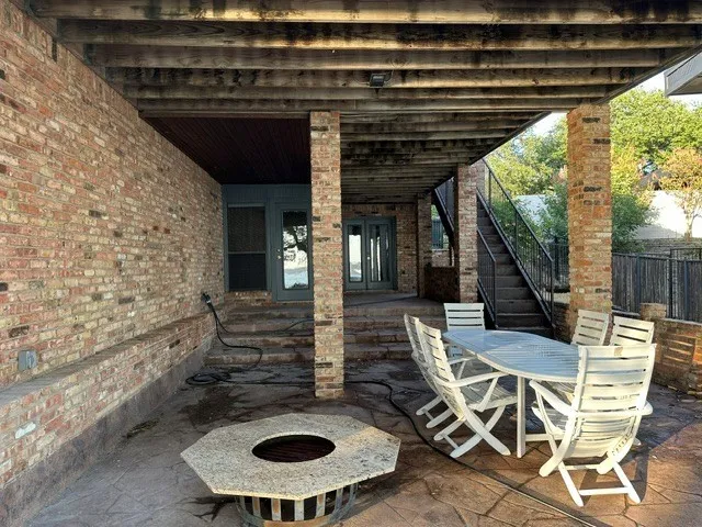 Lower Patio with stairs to Upper Patio