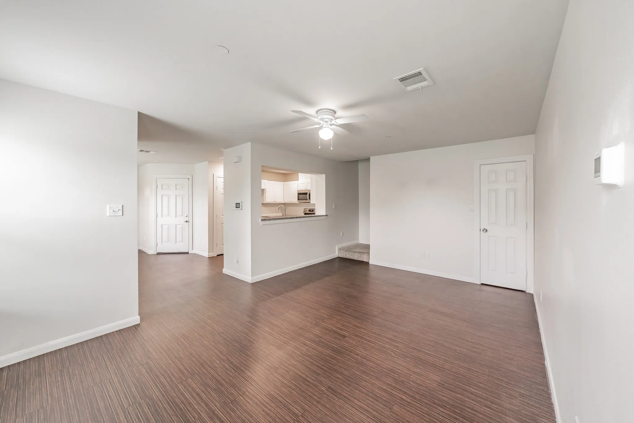 Open concept layout with kitchen