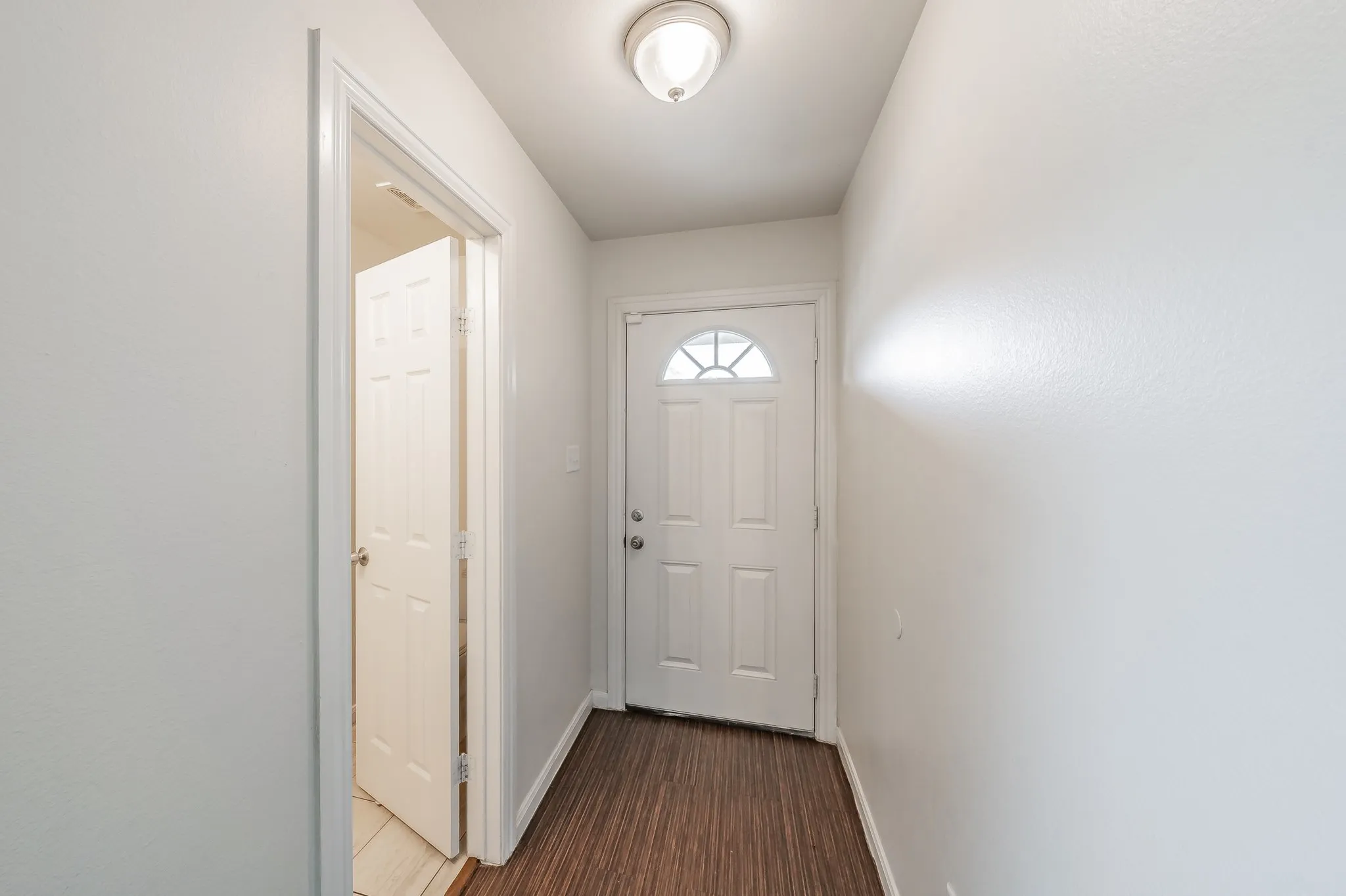 Door opens up to half bathroom
