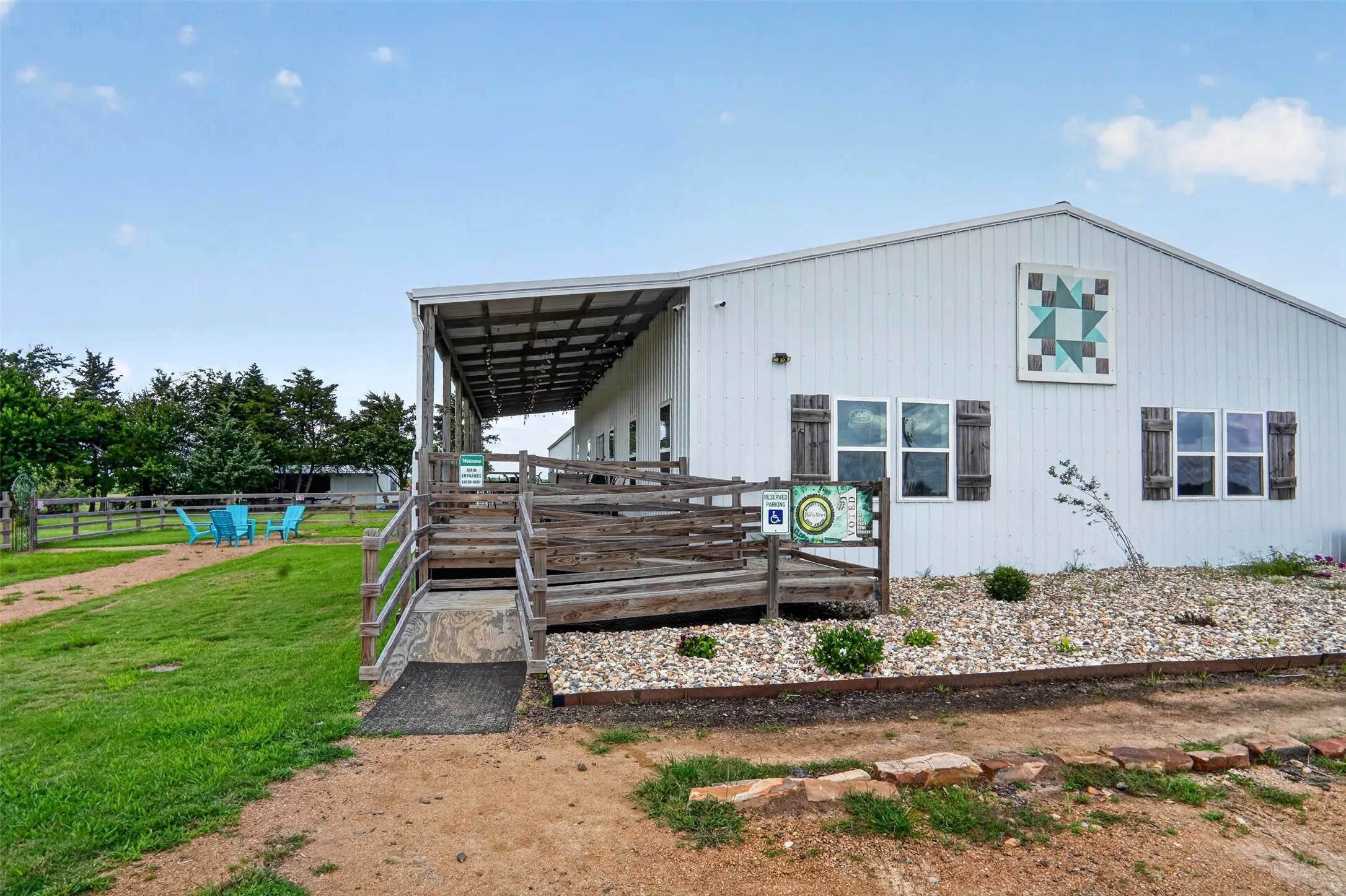 View of deck and front entrance of the building