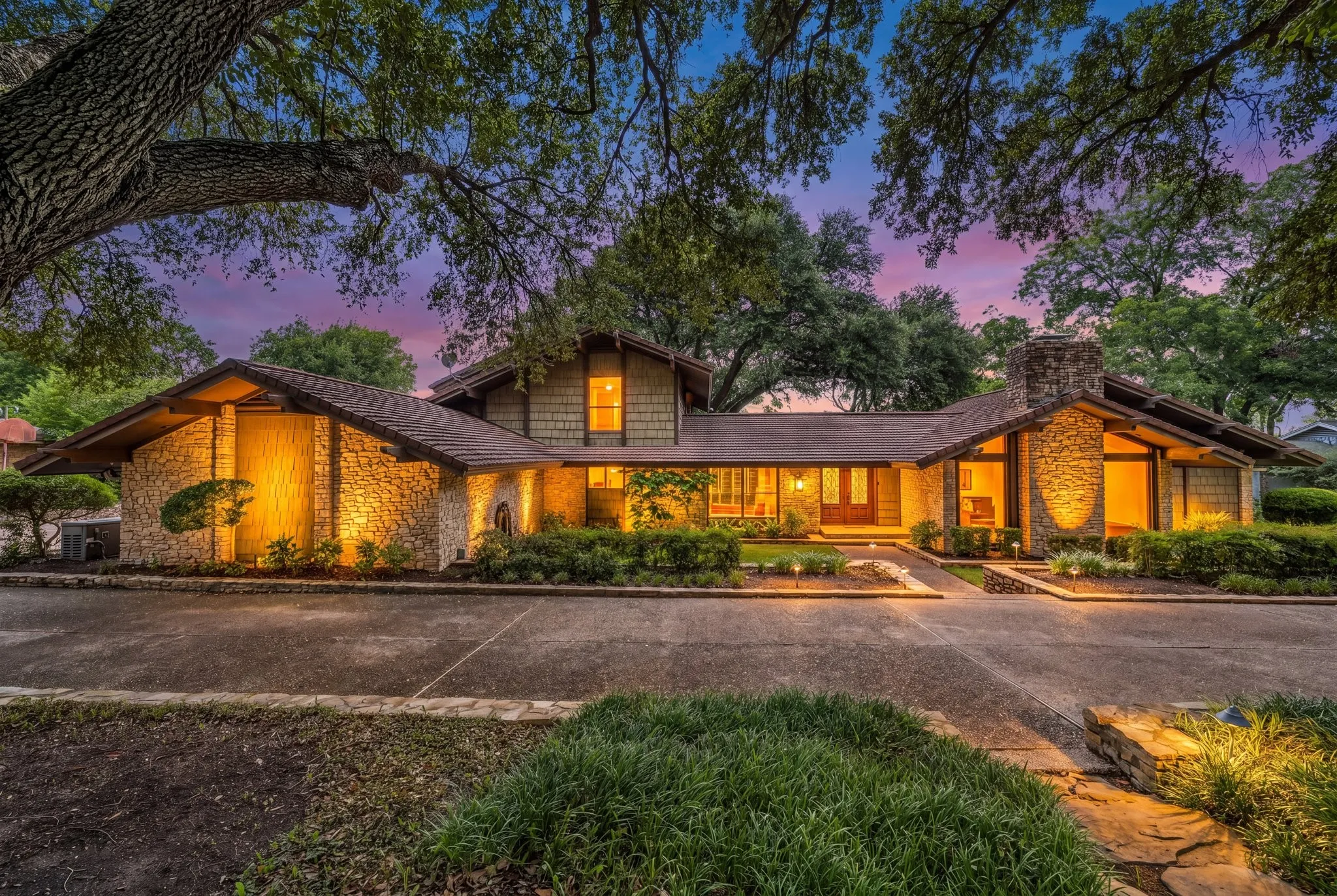 Stone and wood-shingle exterior with multiple gables