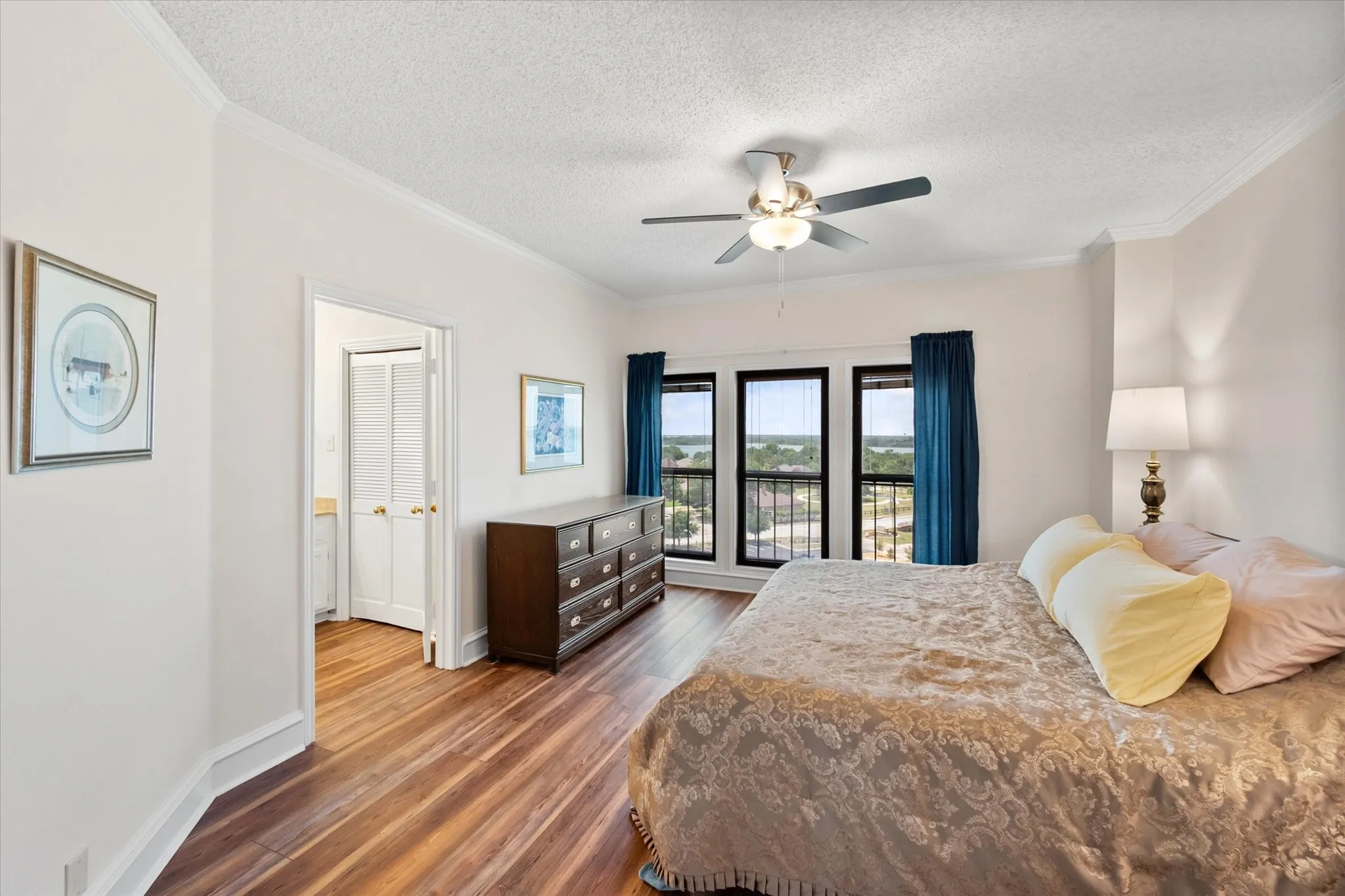 Primary bedroom with scenic views.