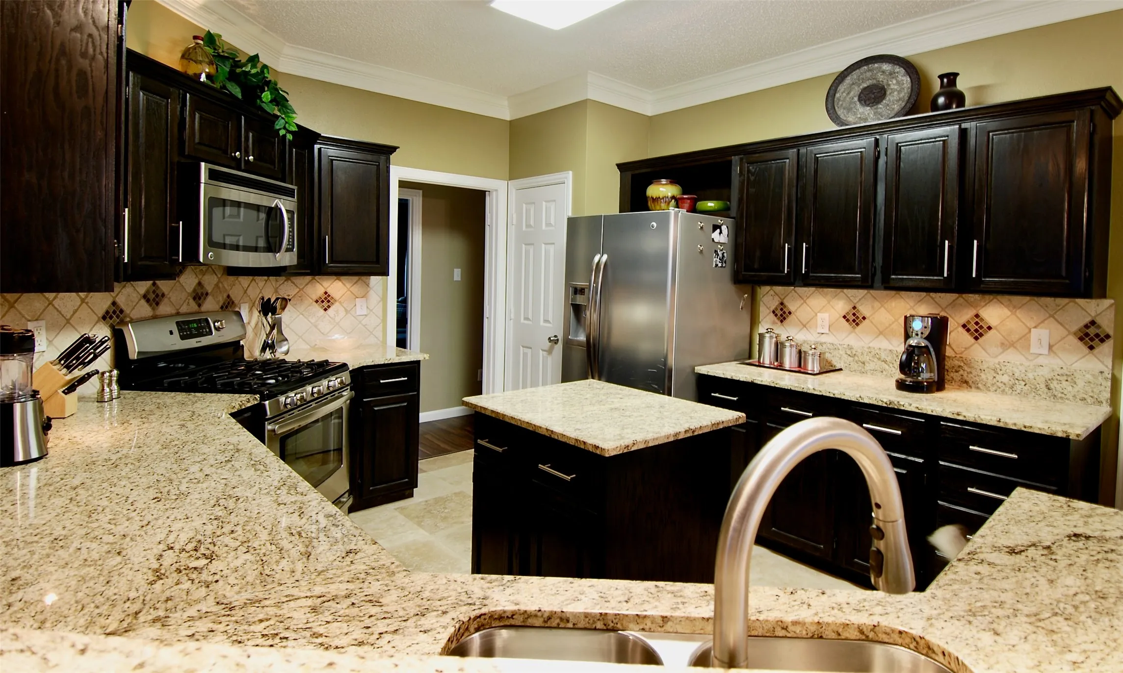 Beautiful Kitchen with Granite Counter Tops & Abundant Cabinets