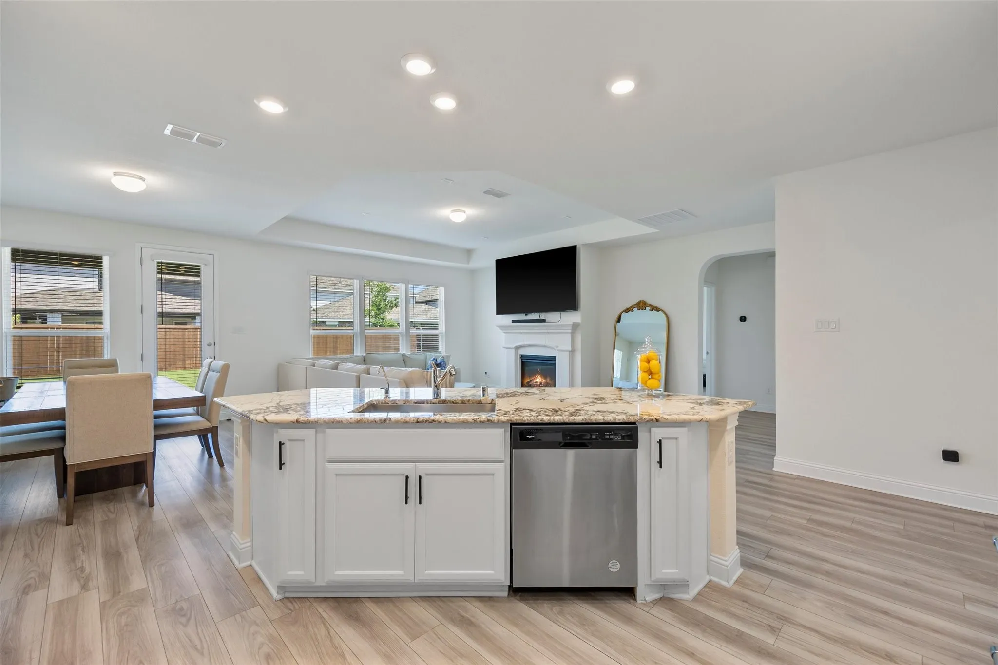 Kitchen overlooks dining and family room.