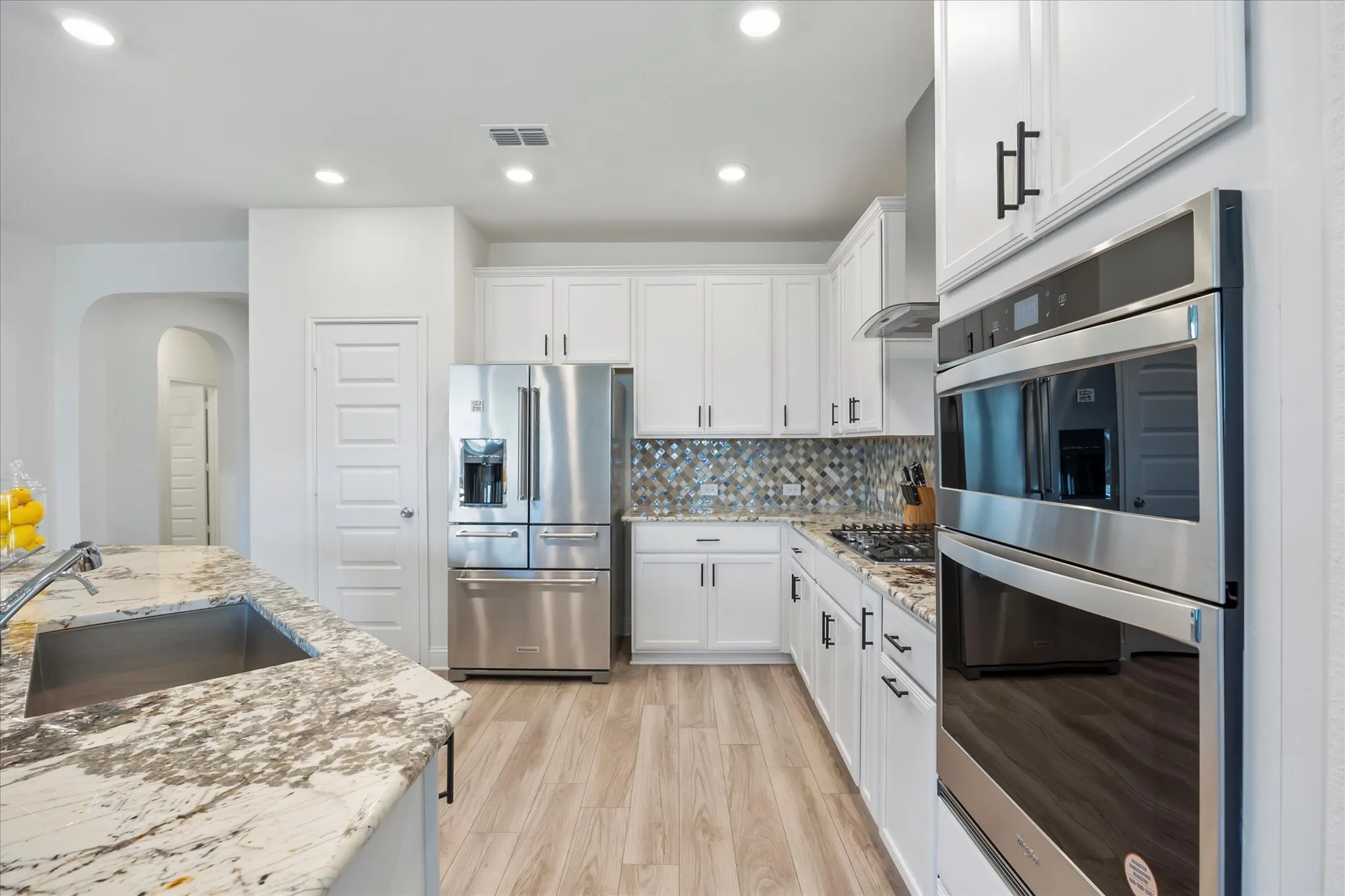 Incredible kitchen includes built in dishwasher, cooktop, oven and microwave