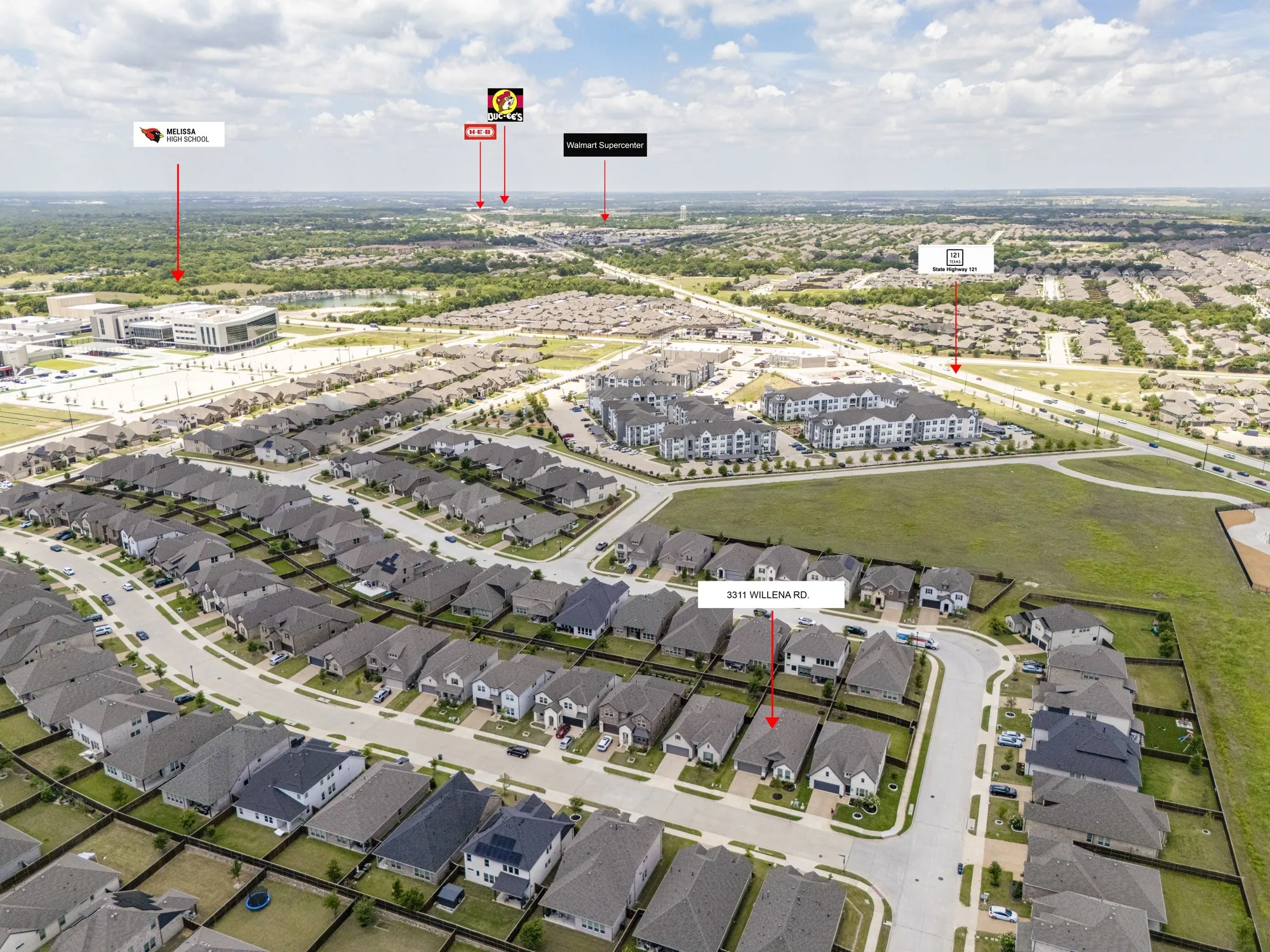 Aerial perspective showcasing a developed residential neighborhood with structured street layouts