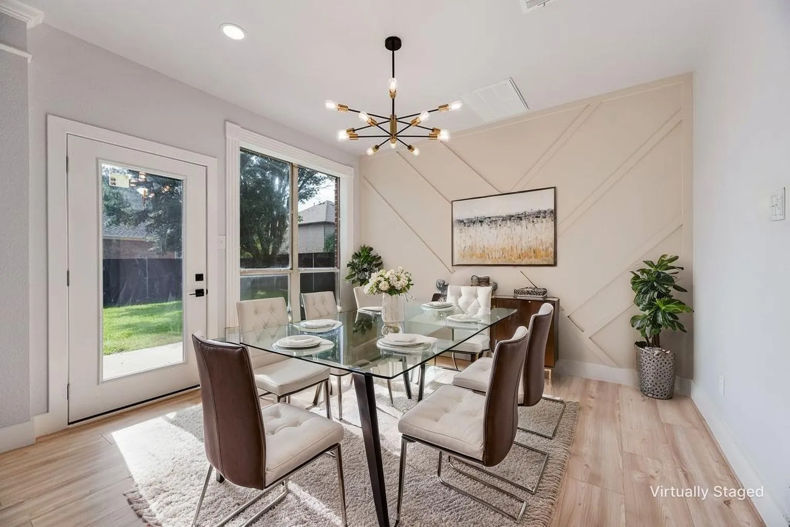 Dining area with window and door leading to the backyard