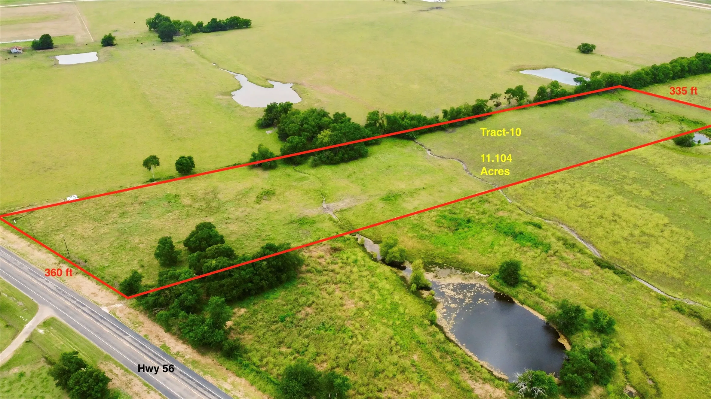 View of property location with a nearby body of water and property parcel outlined
