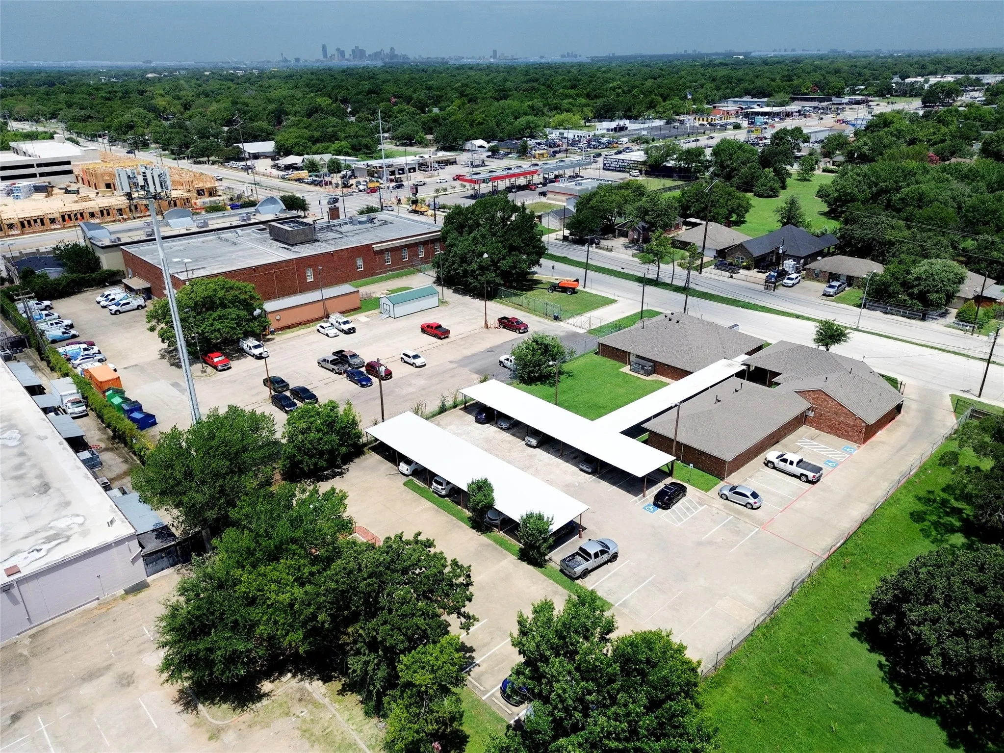 View of the back parking area.  Ample covered parking spots.