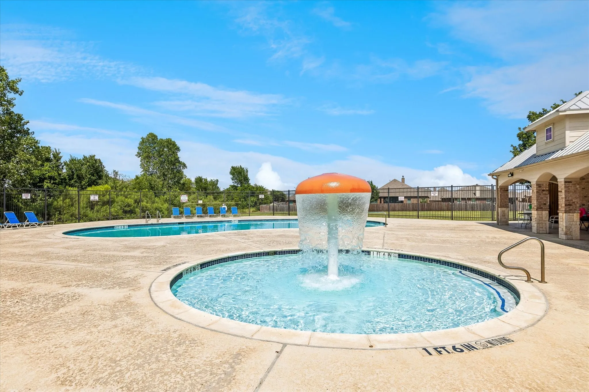 Community pool and playground area