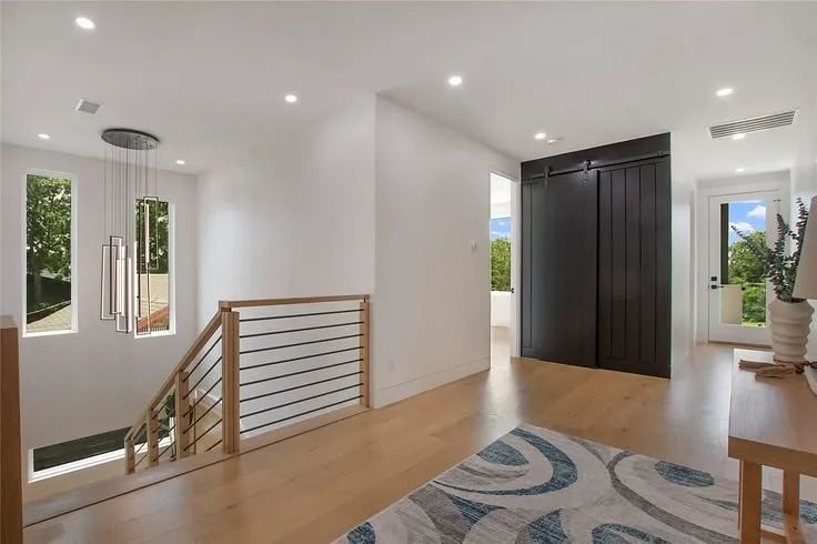 Gracious landing space at the top of the stairs