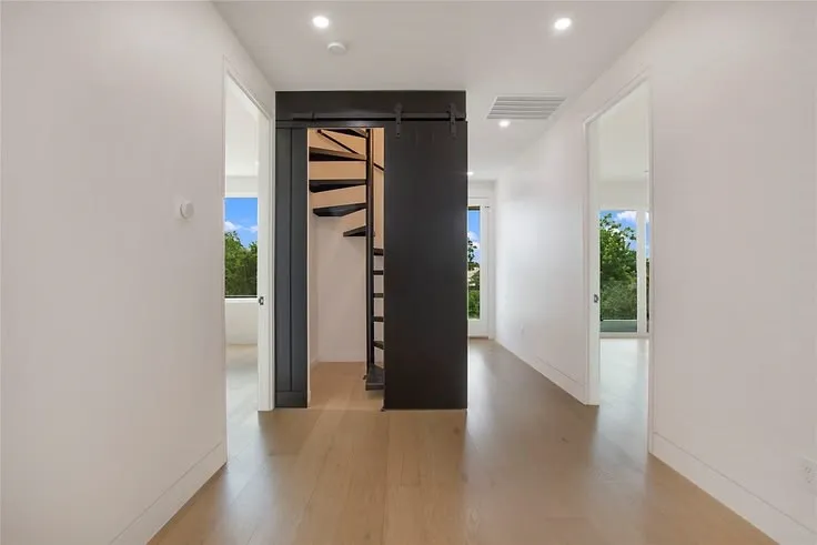 Barn door access to rooftop patio