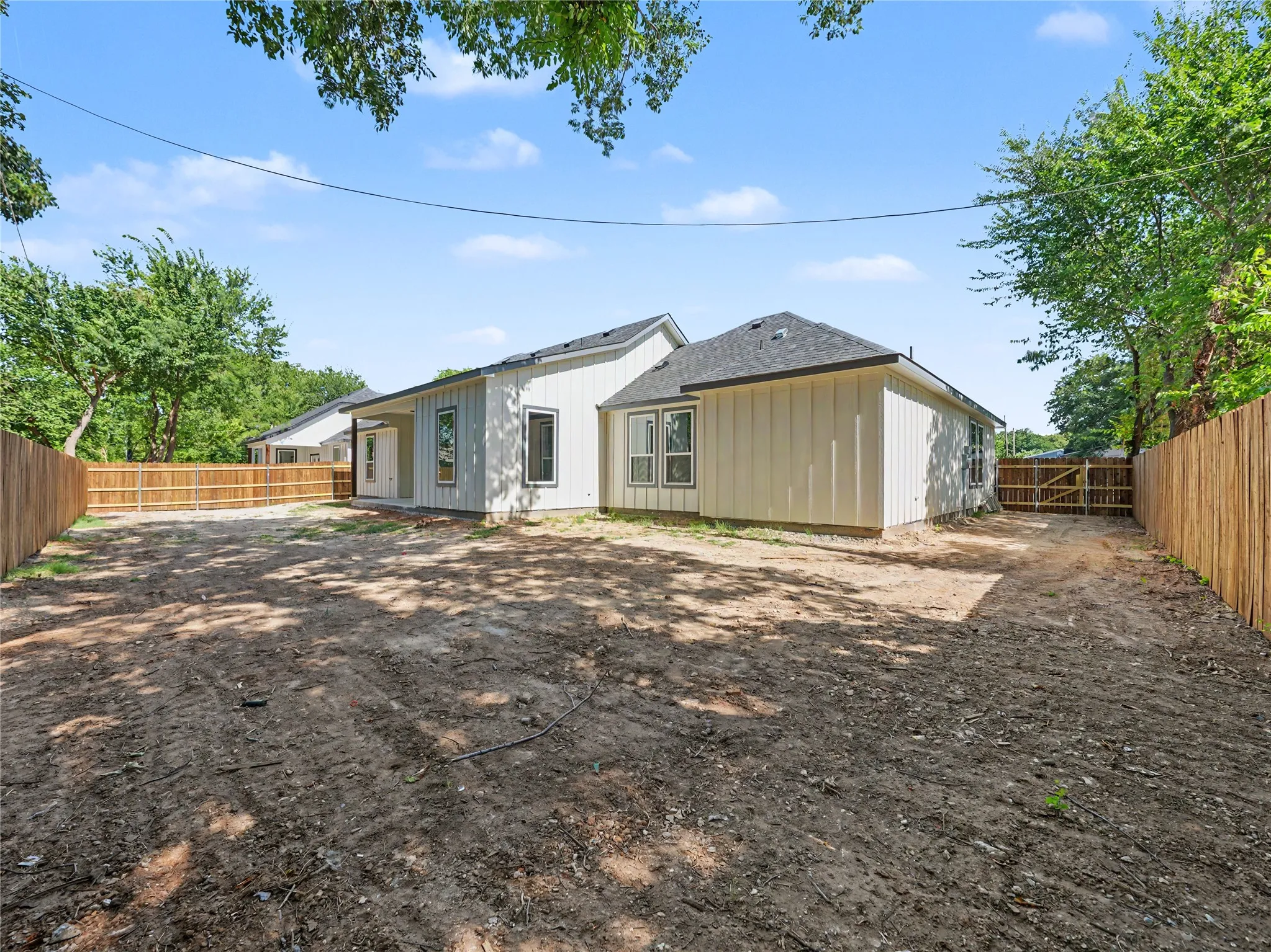 Spacious backyard with privacy fencing
