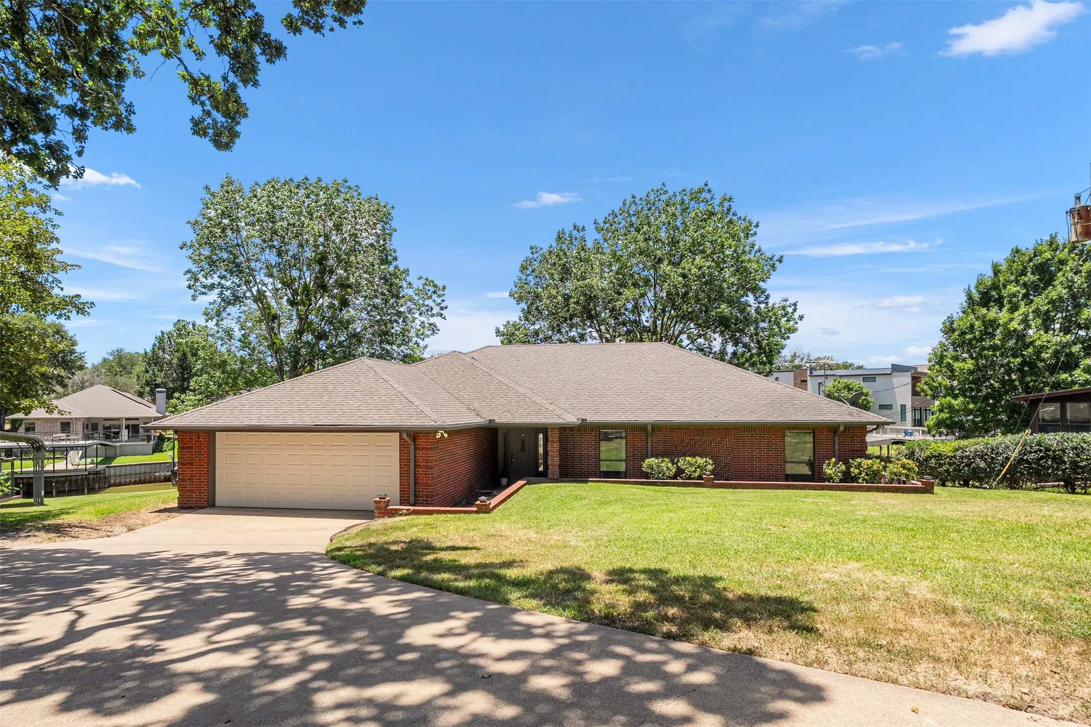 Waterfront home on just under half acre landscaped lot