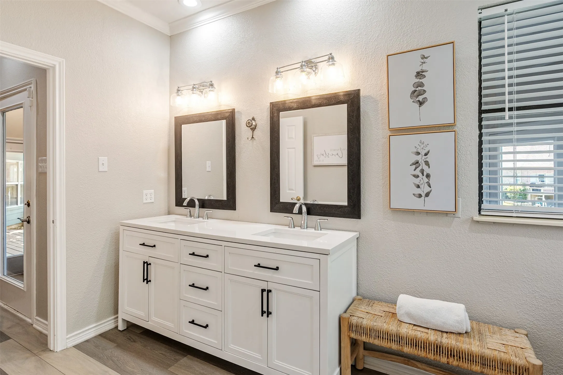 Primary updated bathroom with double sink vanity