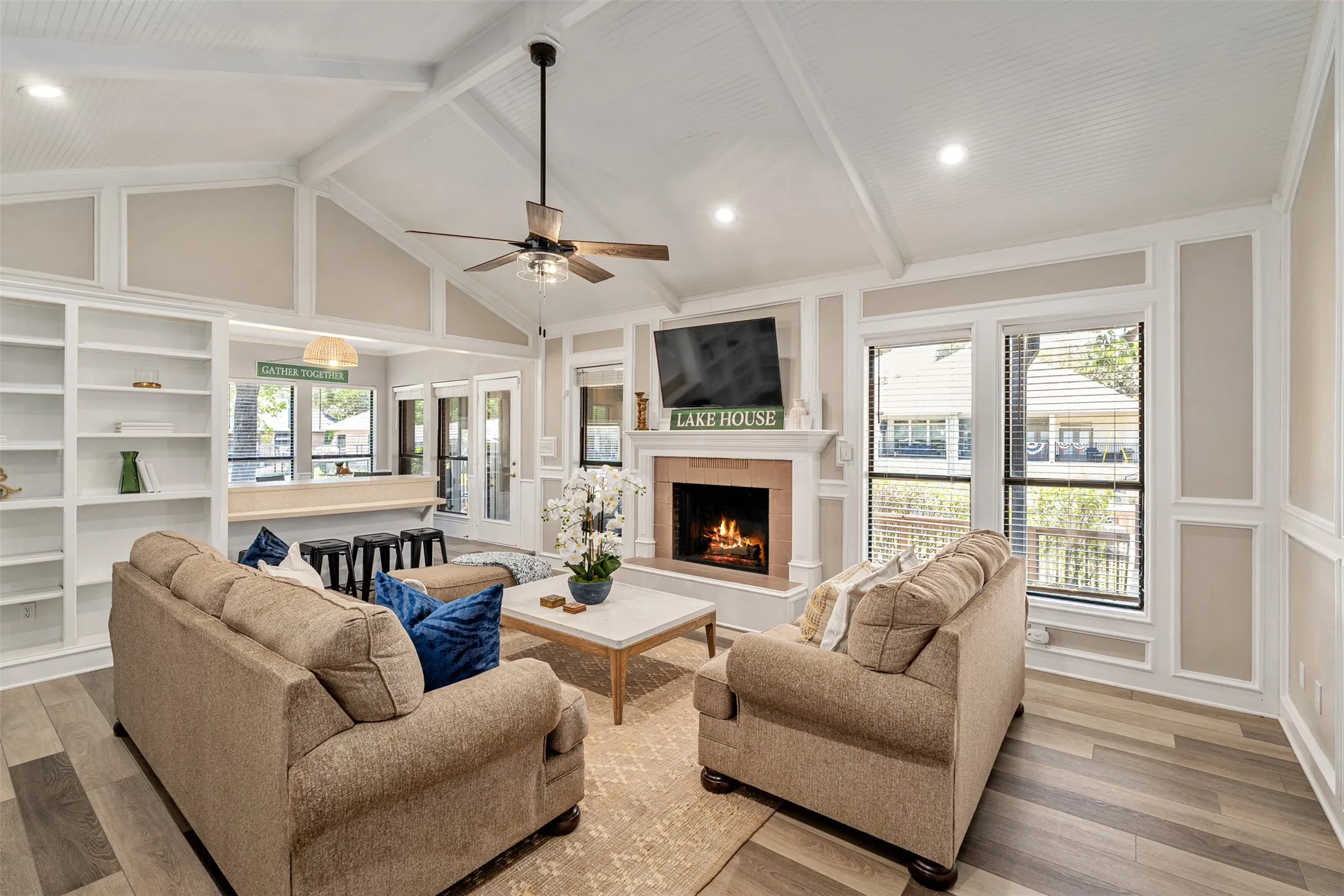 Living room with fireplace, mantle and vaulted ceilings
