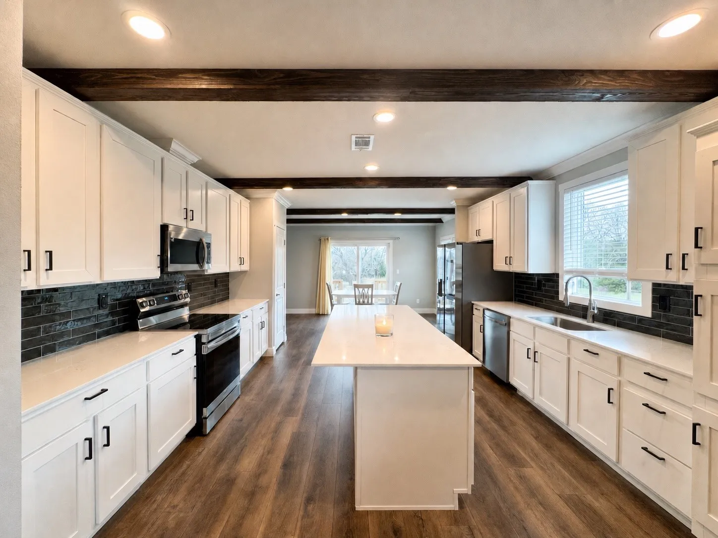 Open concept living w/living and dining on either side of the kitchen. All rooms have been virtually staged.