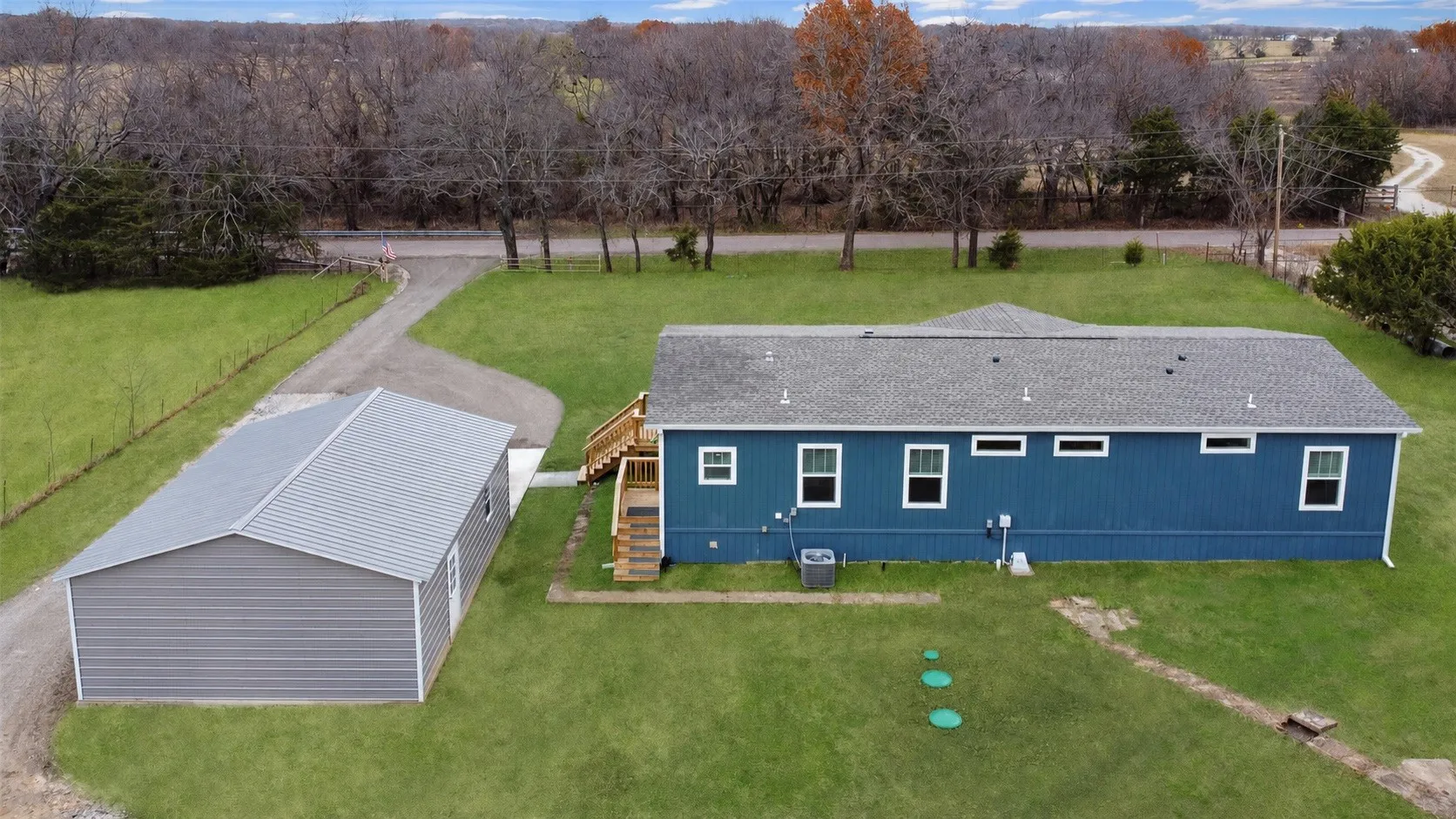 Enjoy beautiful views in every direction from this picturesque, tree-filled 7.5 acre property, complete with a spacious garage and impressive workshop. All rooms have been virtually staged.