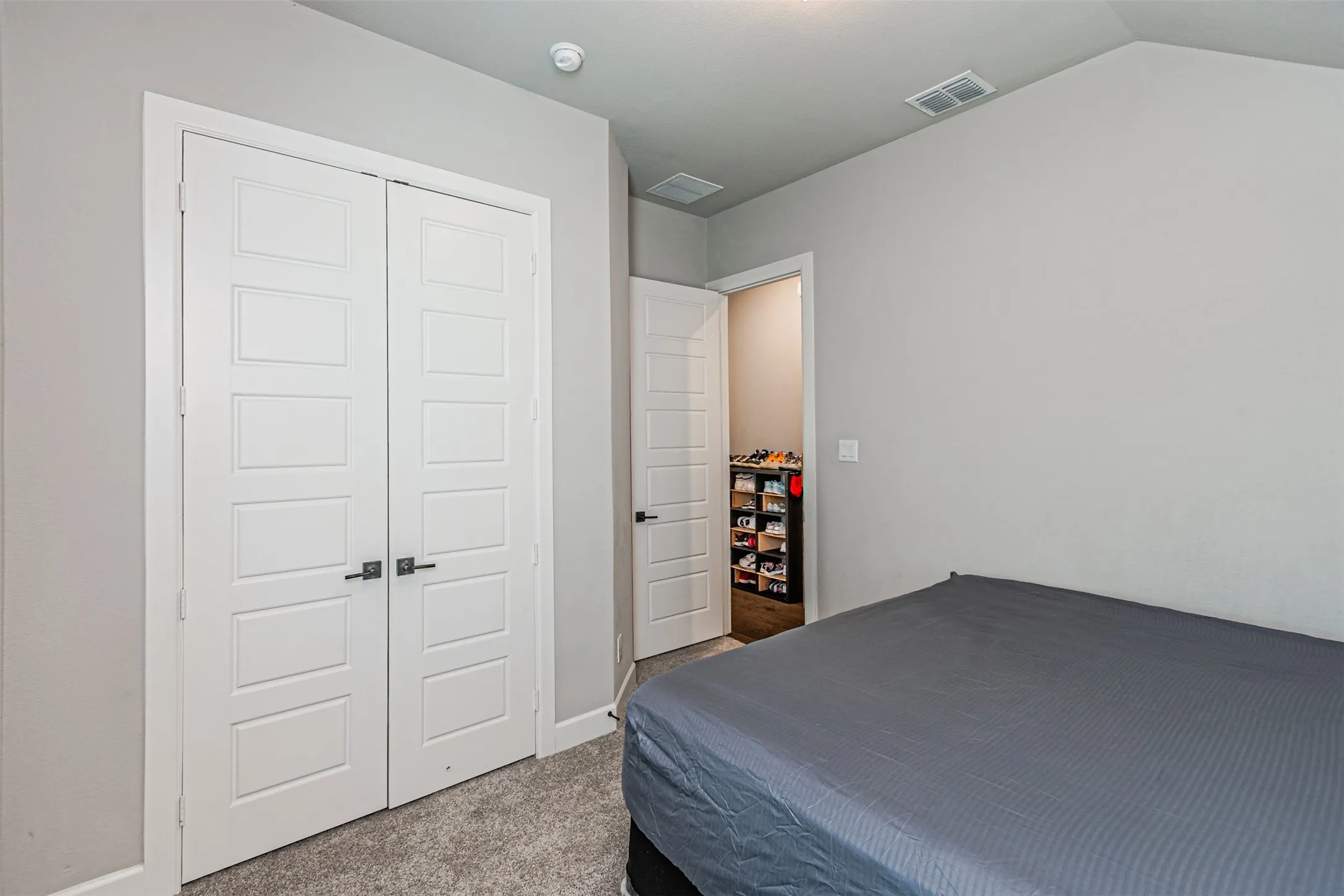 Double panel doors with matte black hardware