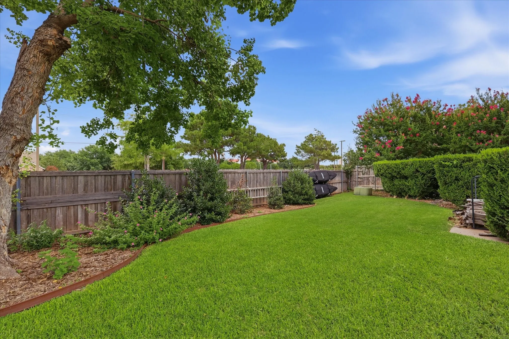 A view from the back corner towards the side driveway.