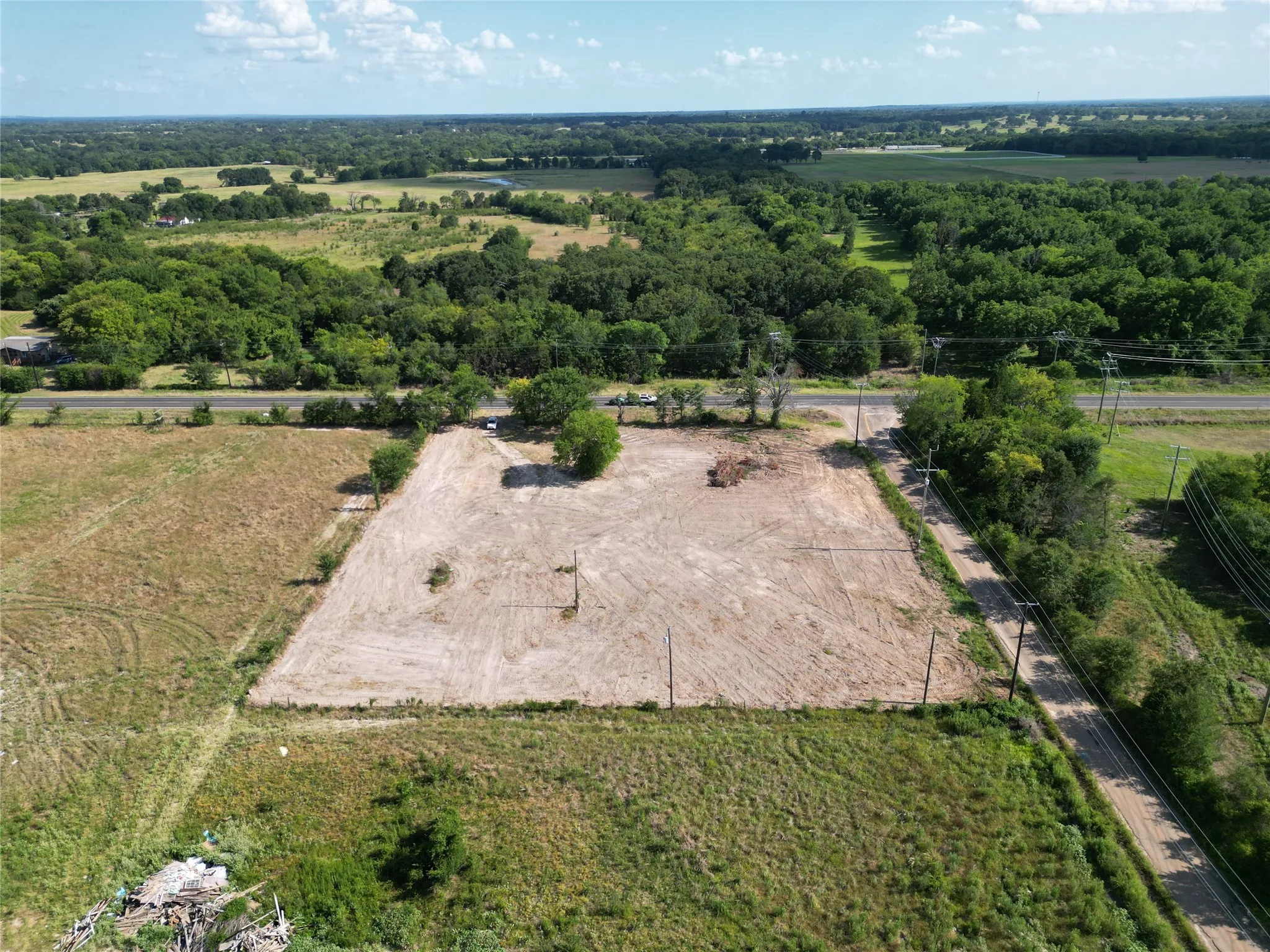 Expansive cleared lot with direct road frontage