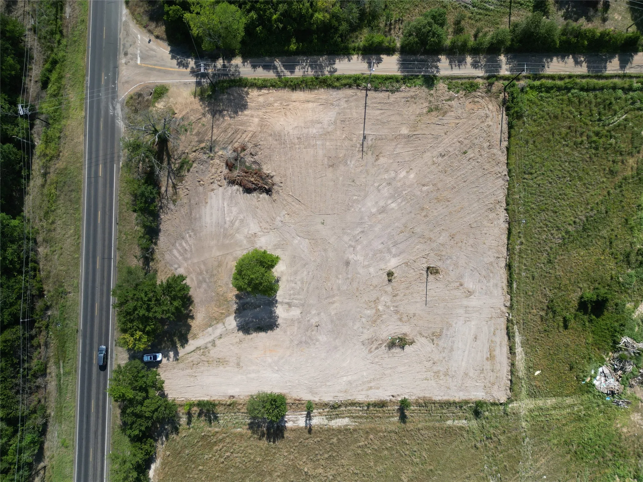 Expansive cleared land parcel offering roadside frontage