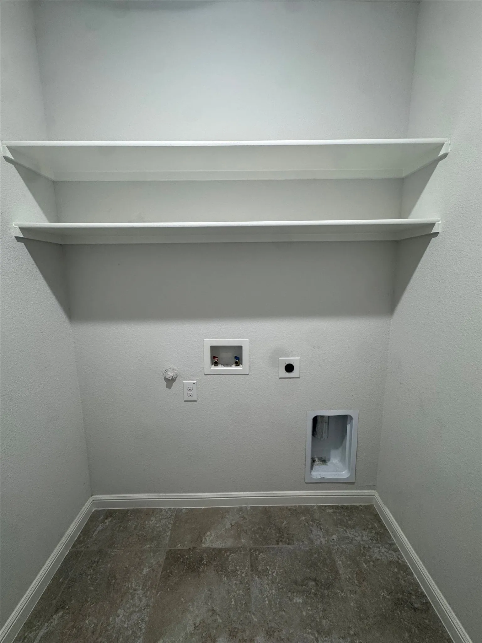 Built-in shelving, durable flooring, and dedicated appliance hookups