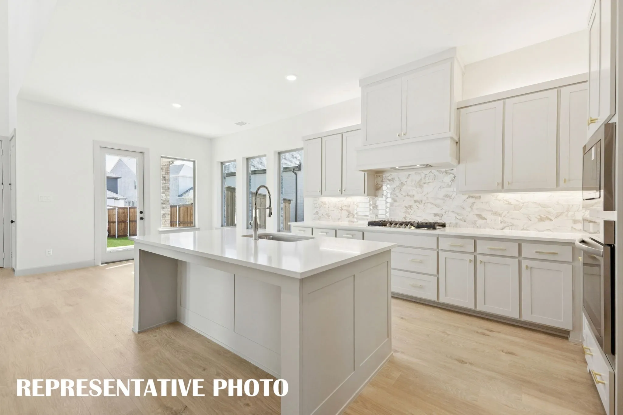 There is no shortage of storage, prep space or style in this over the top, chef inspired kitchen!  REPRESENTATIVE PHOTO