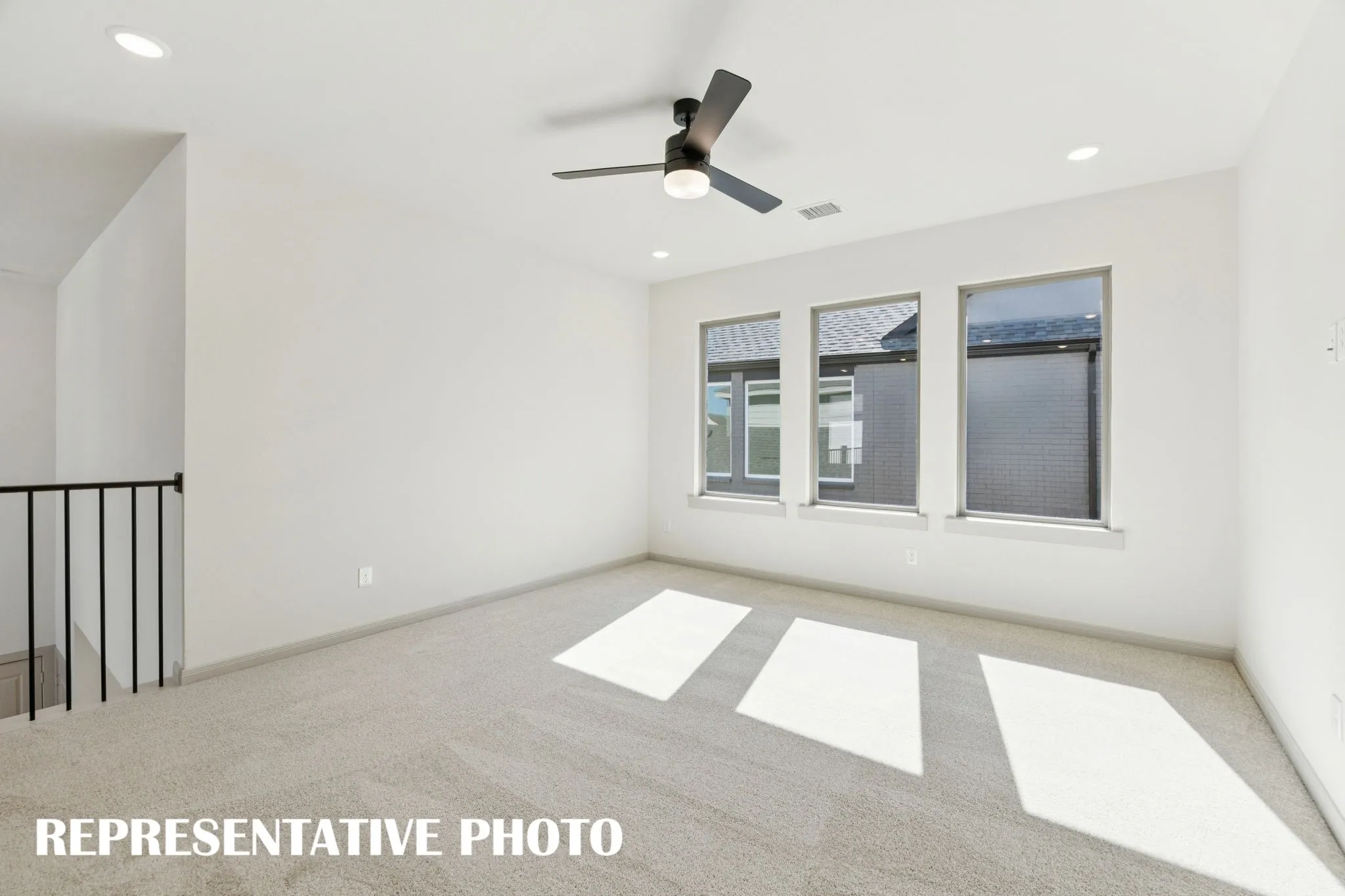 This spacious and light filled game room is the ideal place to host those big game day parties!  REPRESENTATIVE PHOTO