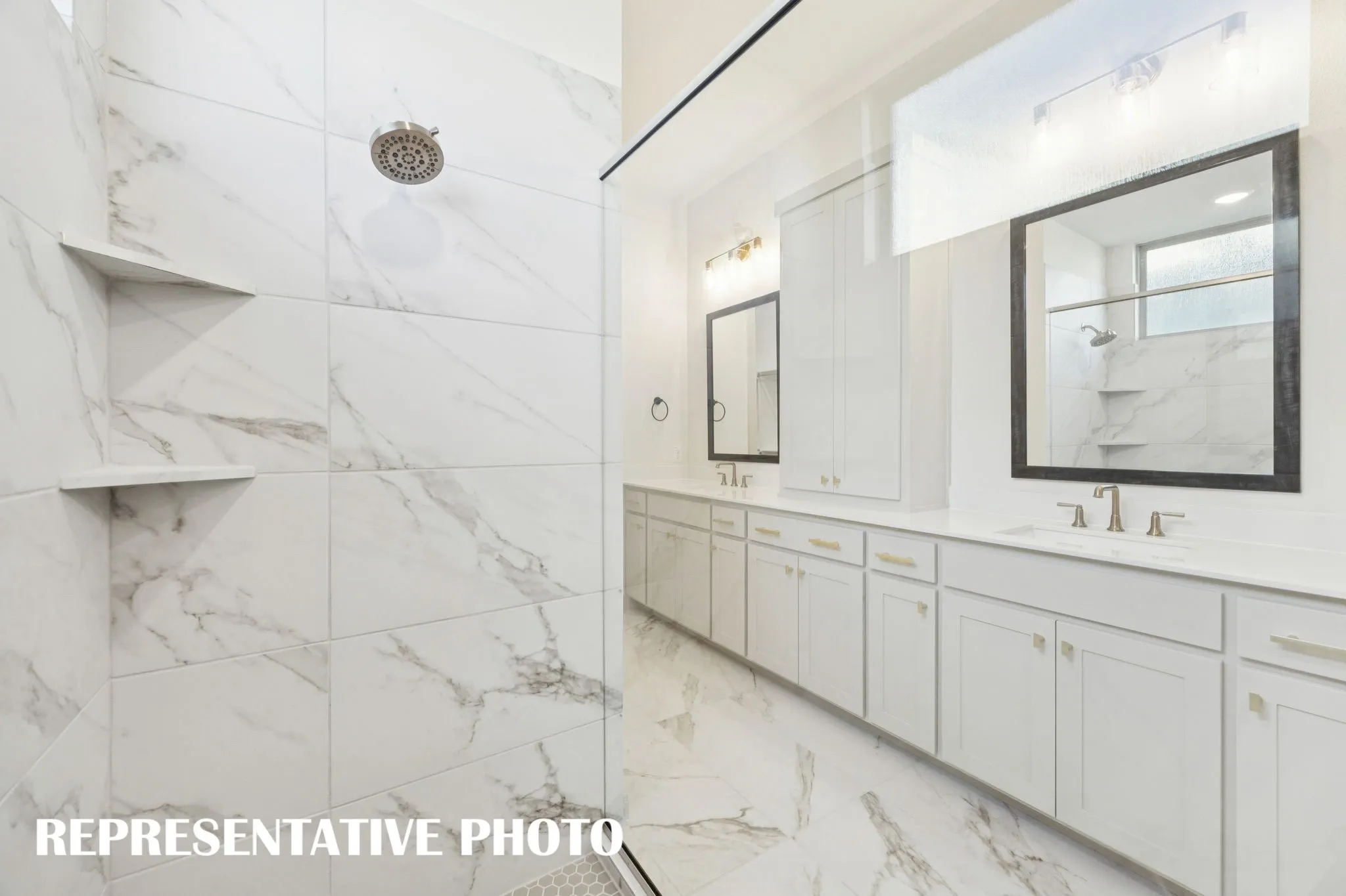 Featuring ample space for two and an abundance of style, this owner's bath is a dream come true!  REPRESENTATIVE PHOTO