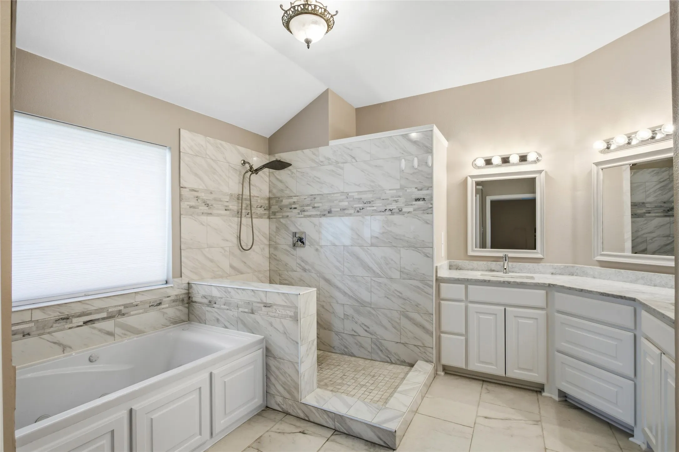 Renovated with big walk-in shower and dual vanities