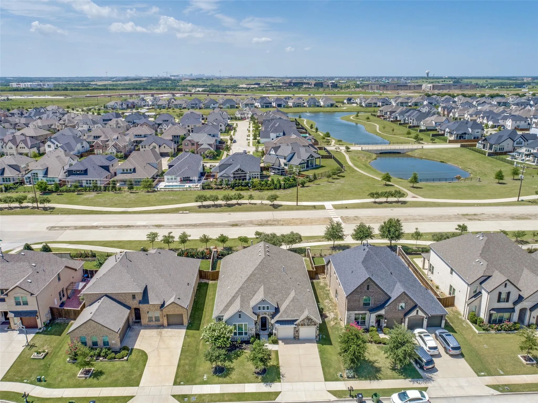 Aerial overview of a residential community featuring diverse architectural styles