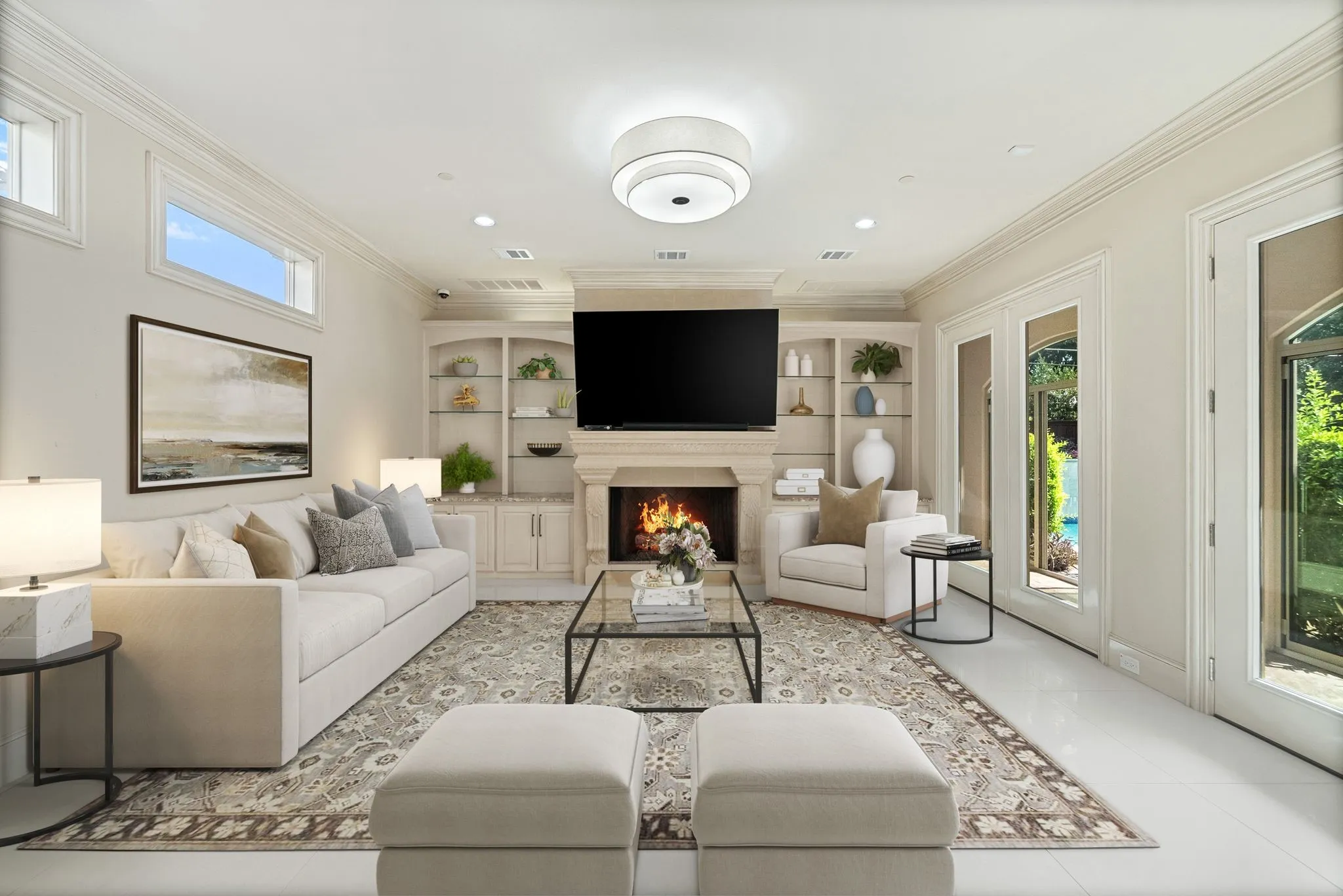 Living room featuring a fireplace with stone surround, built-in shelving with glass inserts, recessed lighting, and crown molding