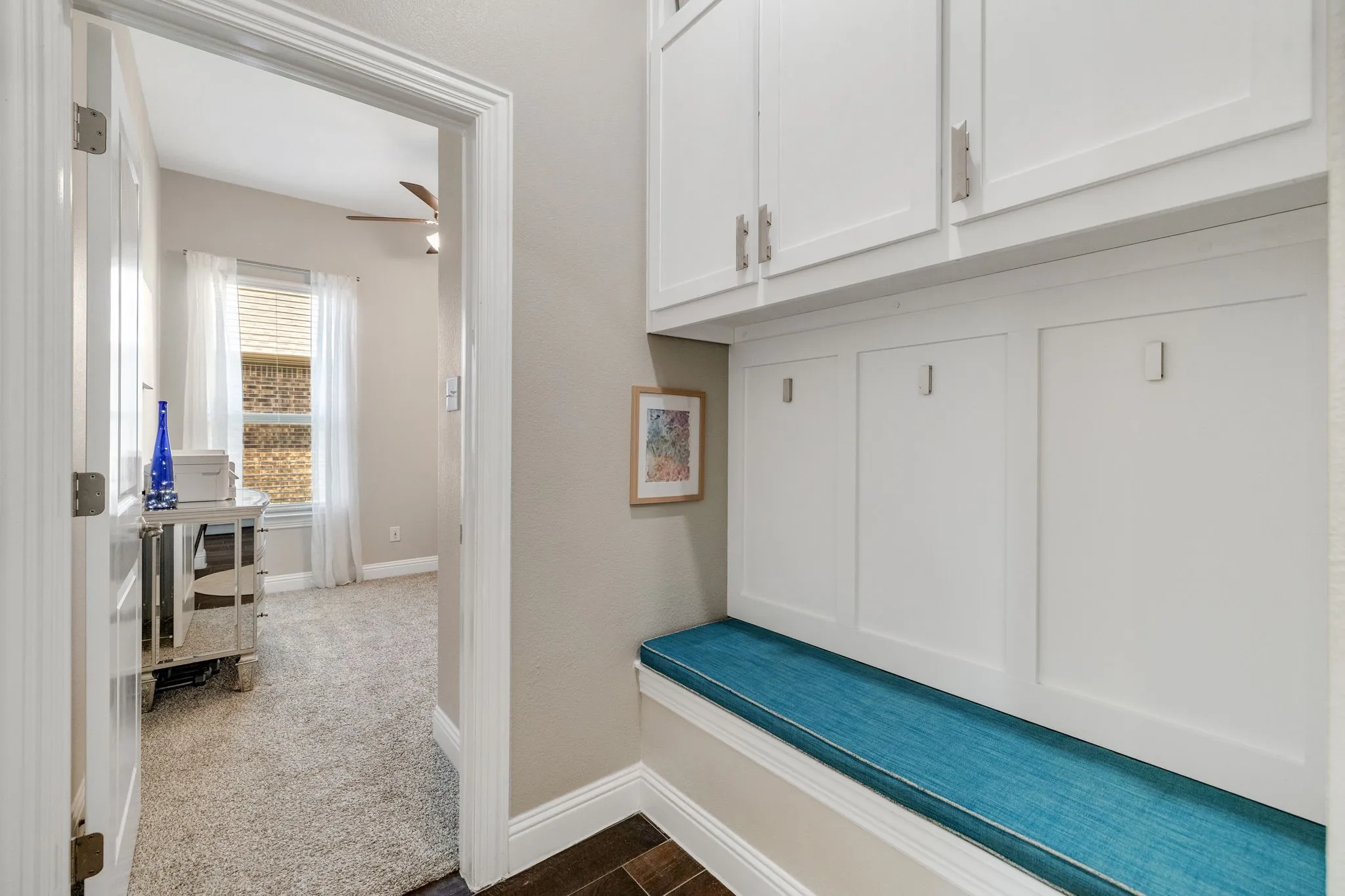 Custom Mud Area w/built-in cabinetry, seating, and smart hooks.