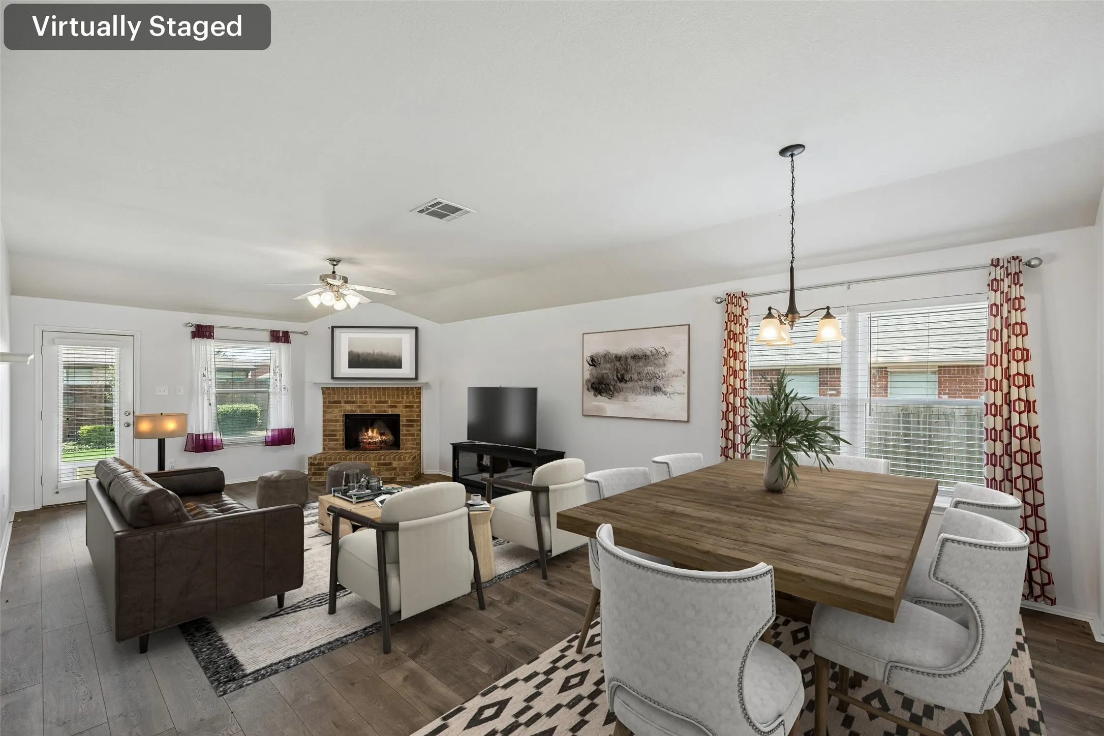 Virtually staged to inspire, this inviting open-concept floor plan highlights the spacious living and dining areas, making it easy to envision yourself at home.