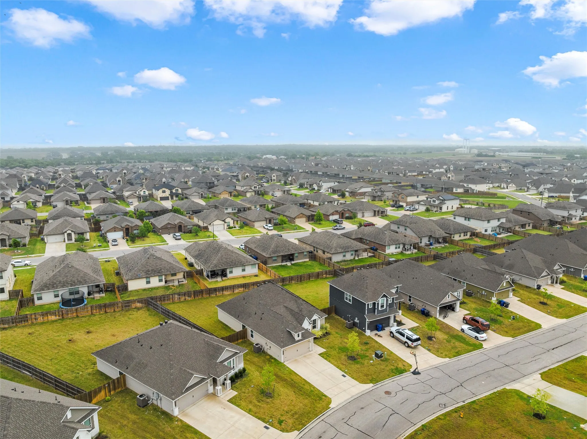Aerial view of a residential neighborhood with numerous single-family homes