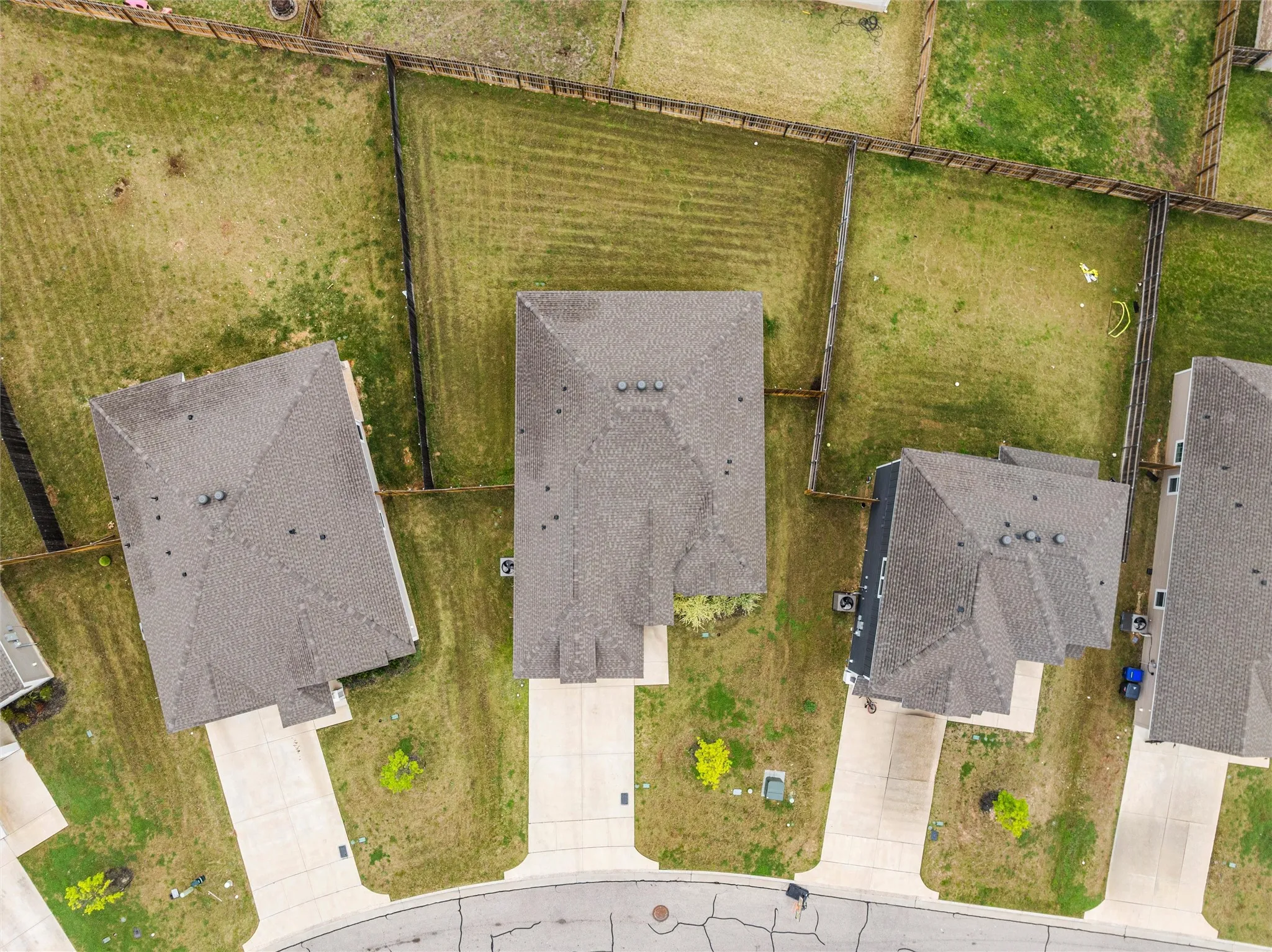 Residential property with a gray asphalt shingle roof