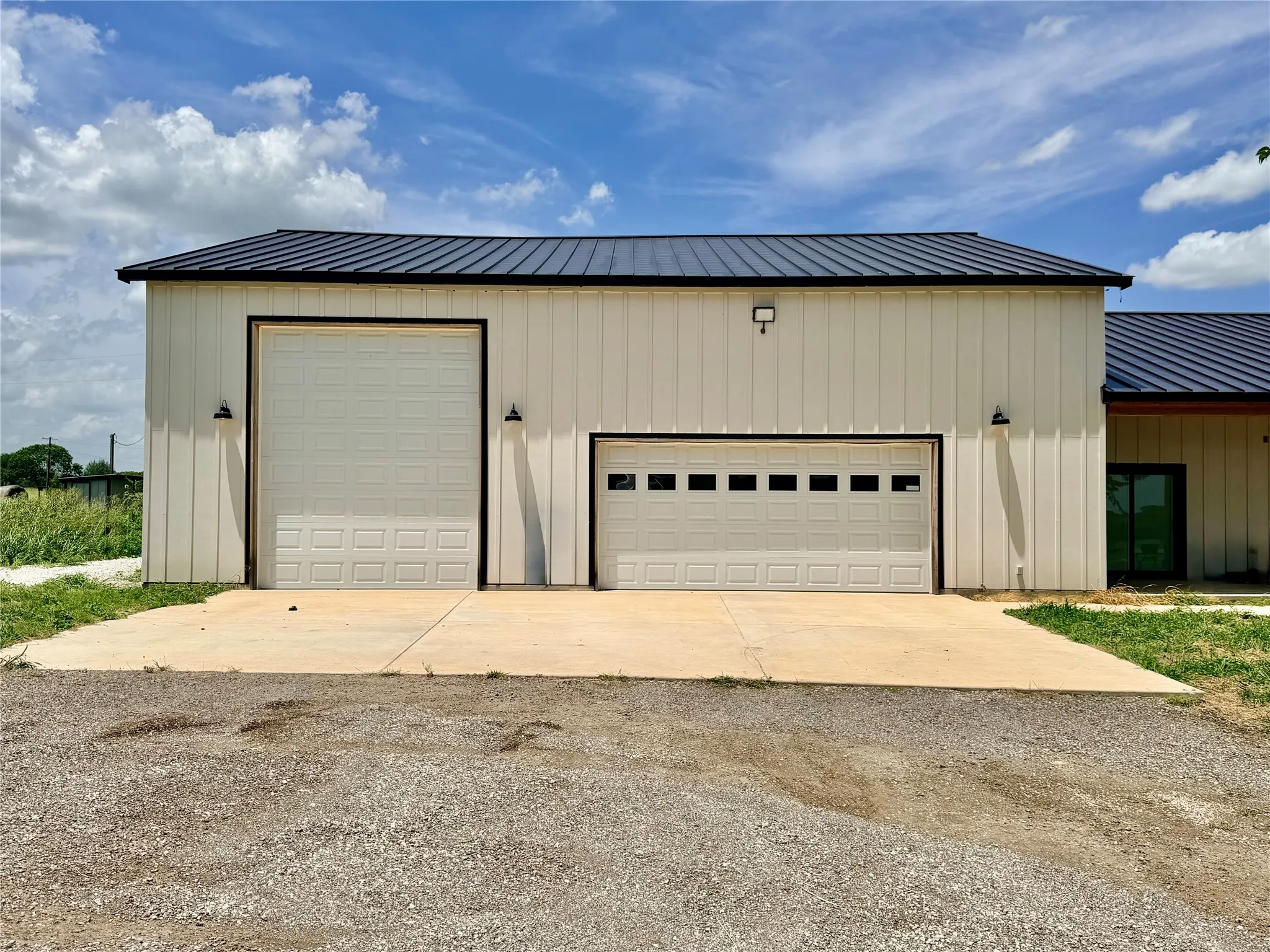 This unique rental comes with incredible garage access, boasting massive bay doors.