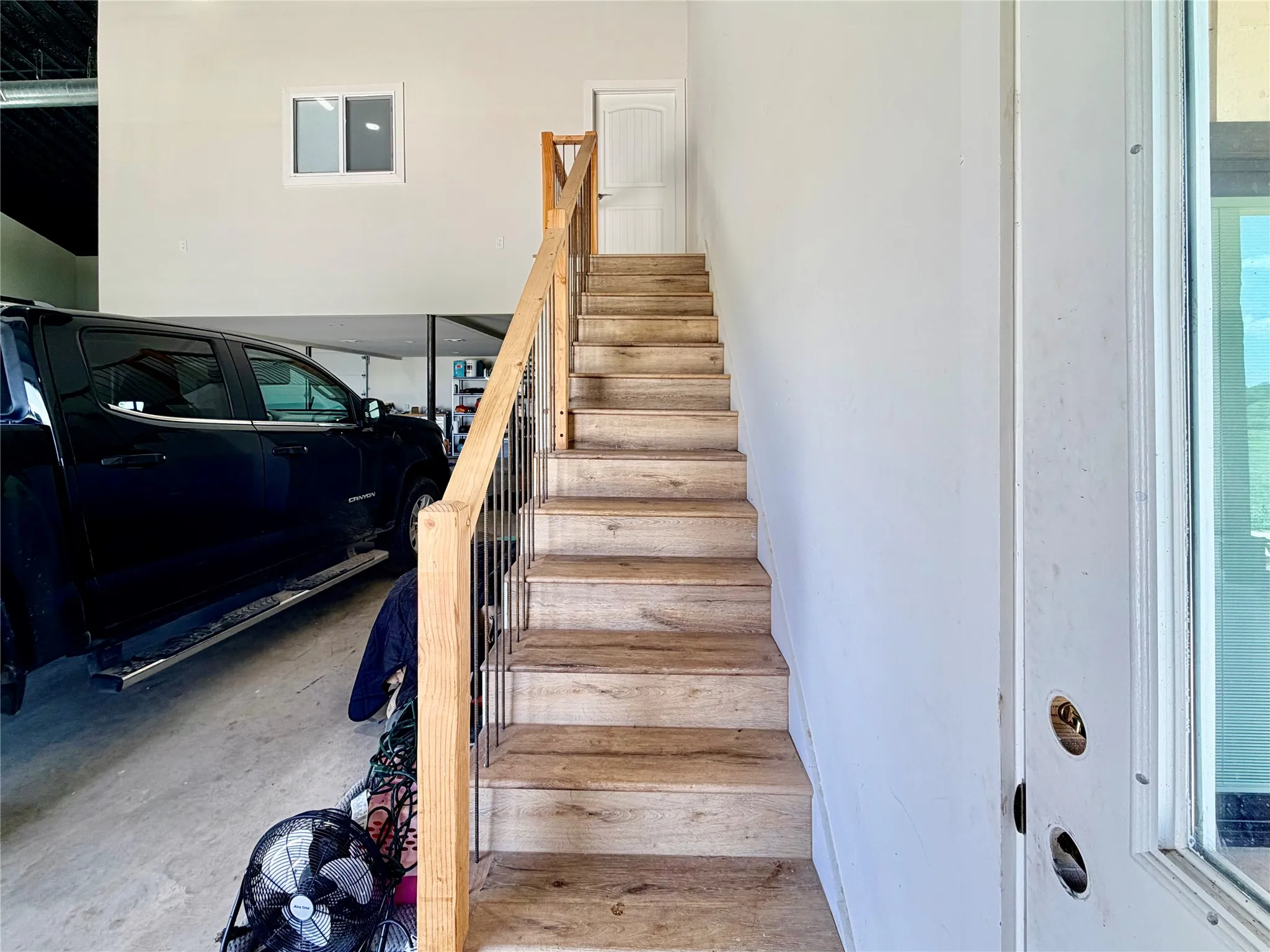 Enjoy the ultimate convenience of direct, weather-sheltered access from your secure garage space straight to your apartment stairs.
