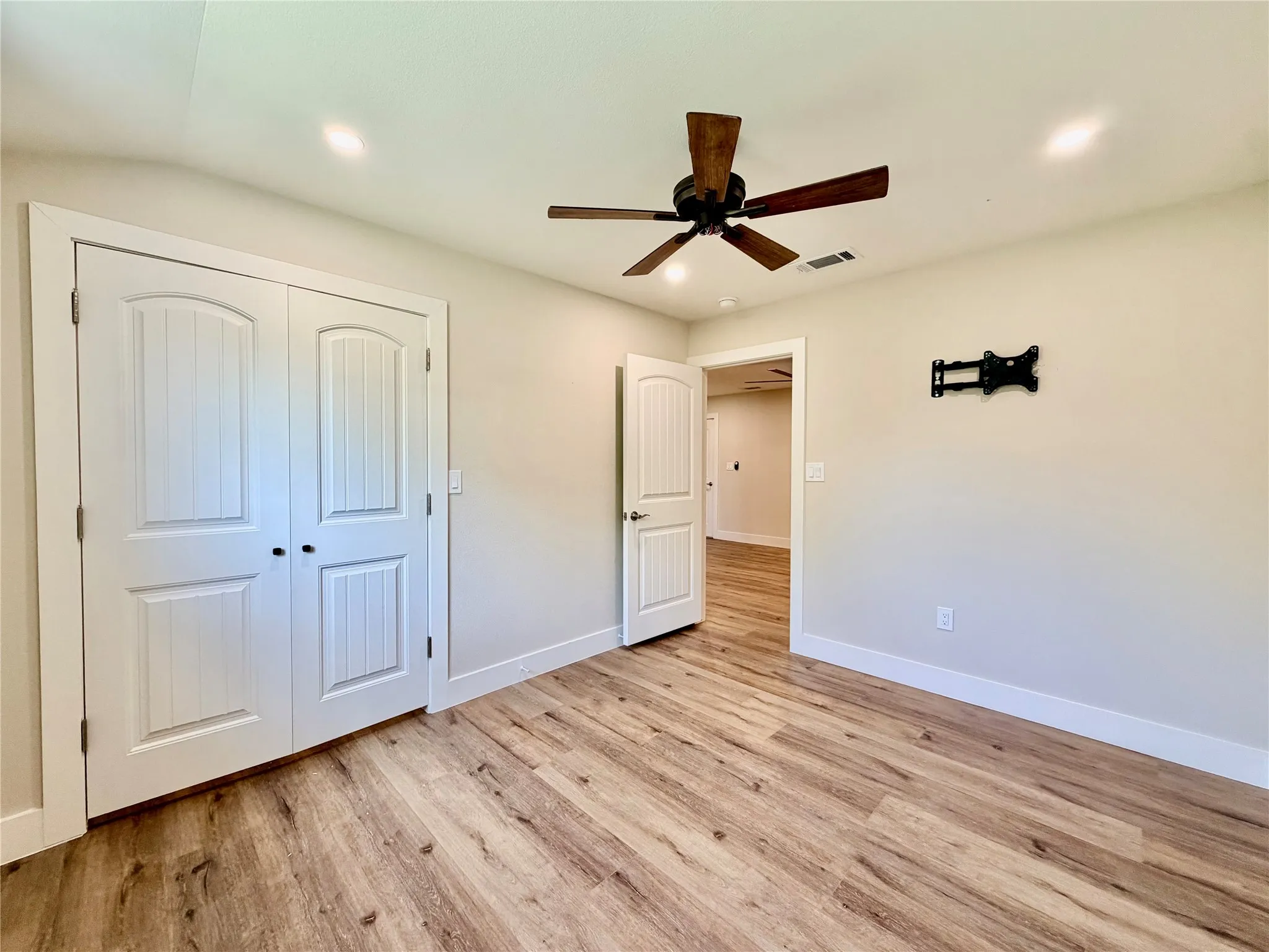 Offering excellent organization, this bedroom features a large, double-door closet to keep all your wardrobe and storage needs neatly tucked away.