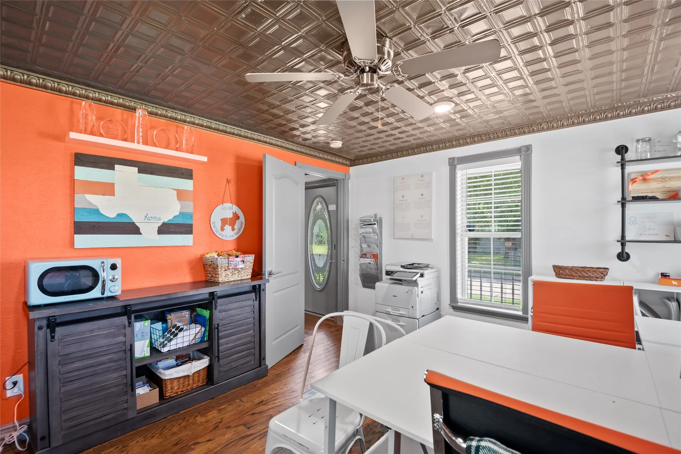 The room features a decorative embossed ceiling and a ceiling fan. Seprate entry and can be locked off.