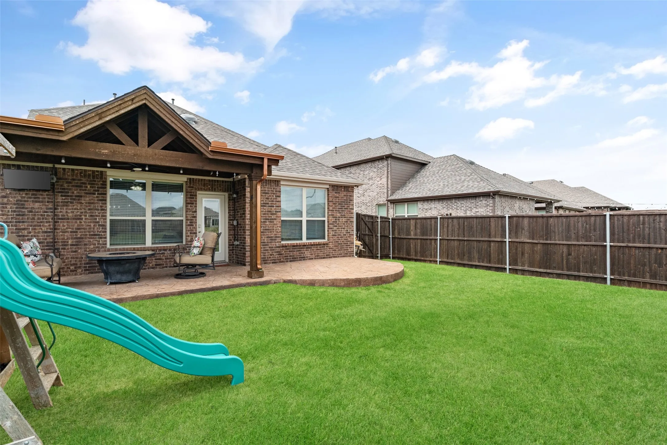 View towards custom covered extended patio.