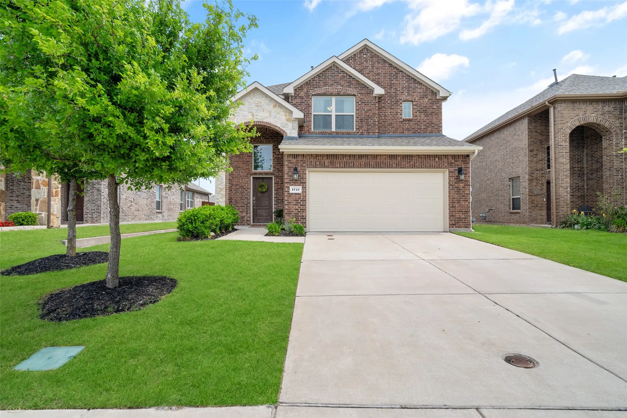 Upgraded Garage with Epoxy Floors, Overhead Storage and more!